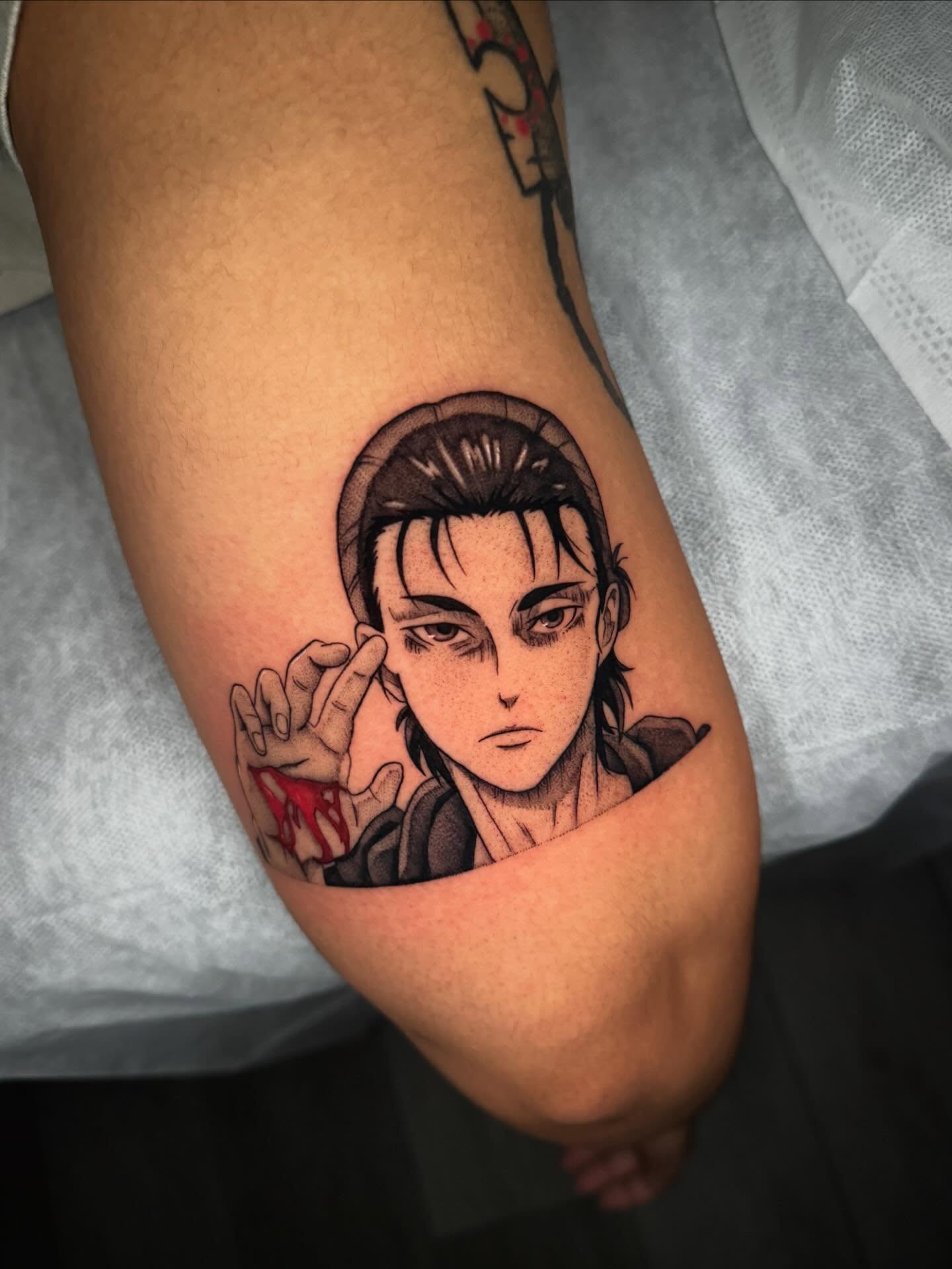 Anime character anime tattoo on the forearm by kelsey hackett