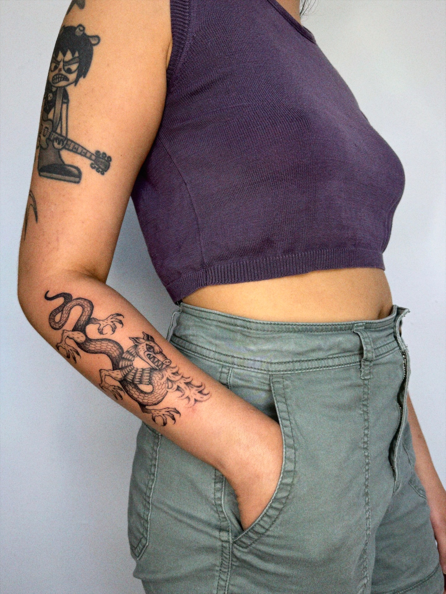Dragon black and grey tattoo on the forearm by @inkshame