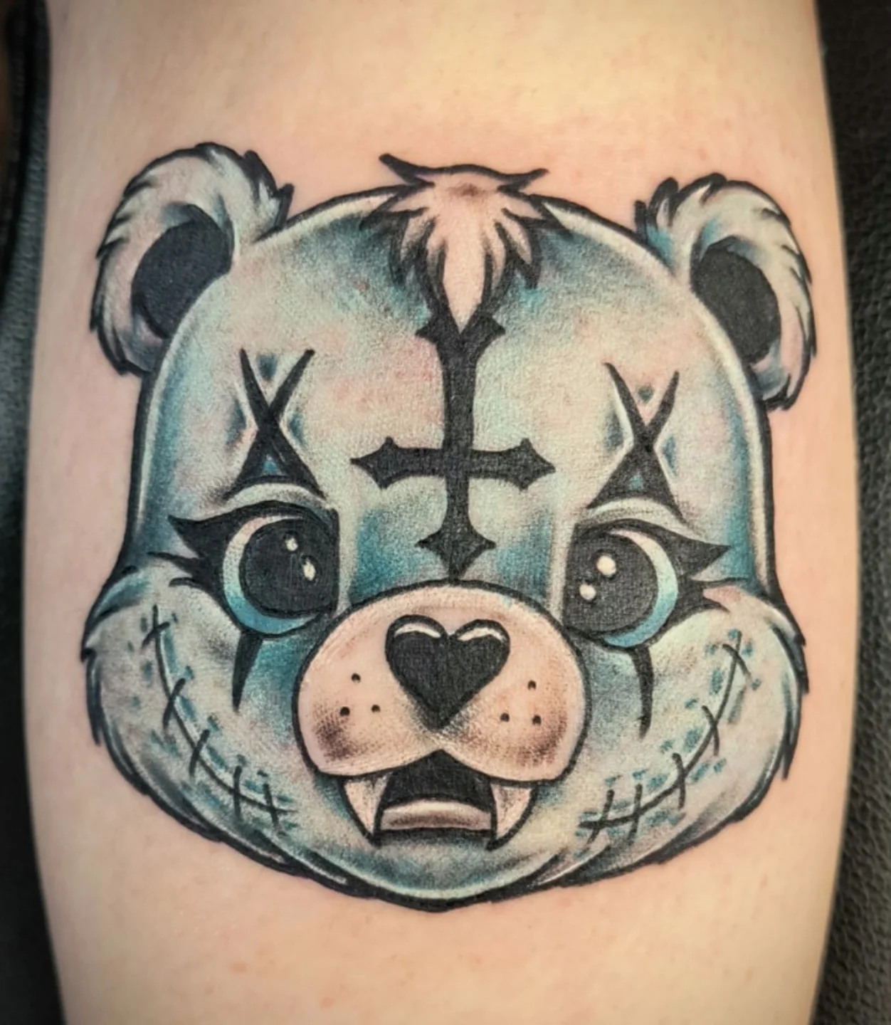 Teddy bear American traditional tattoo on the forearm by Reid