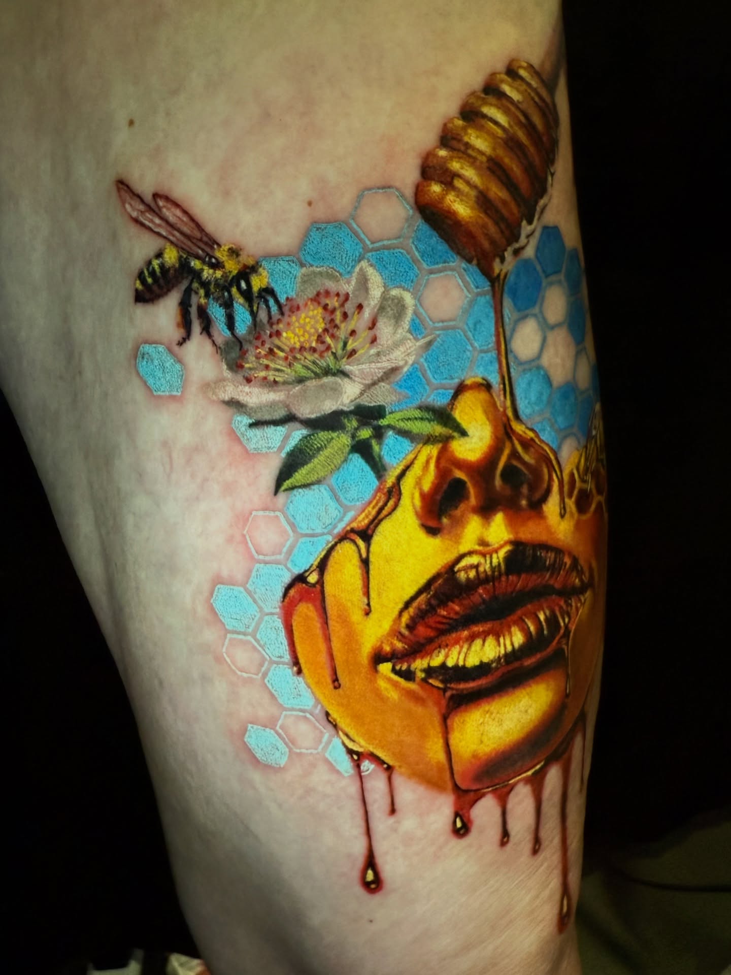 Honeycomb and lips realism tattoo on the forearm by Sam Minter, Grafton, Massachusetts