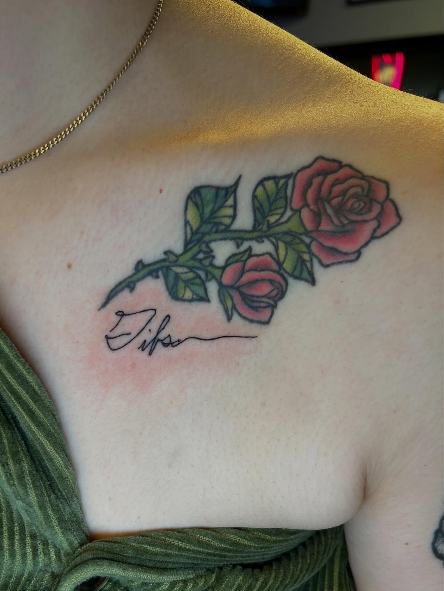 Roses American traditional tattoo on the chest by Alexis Skye