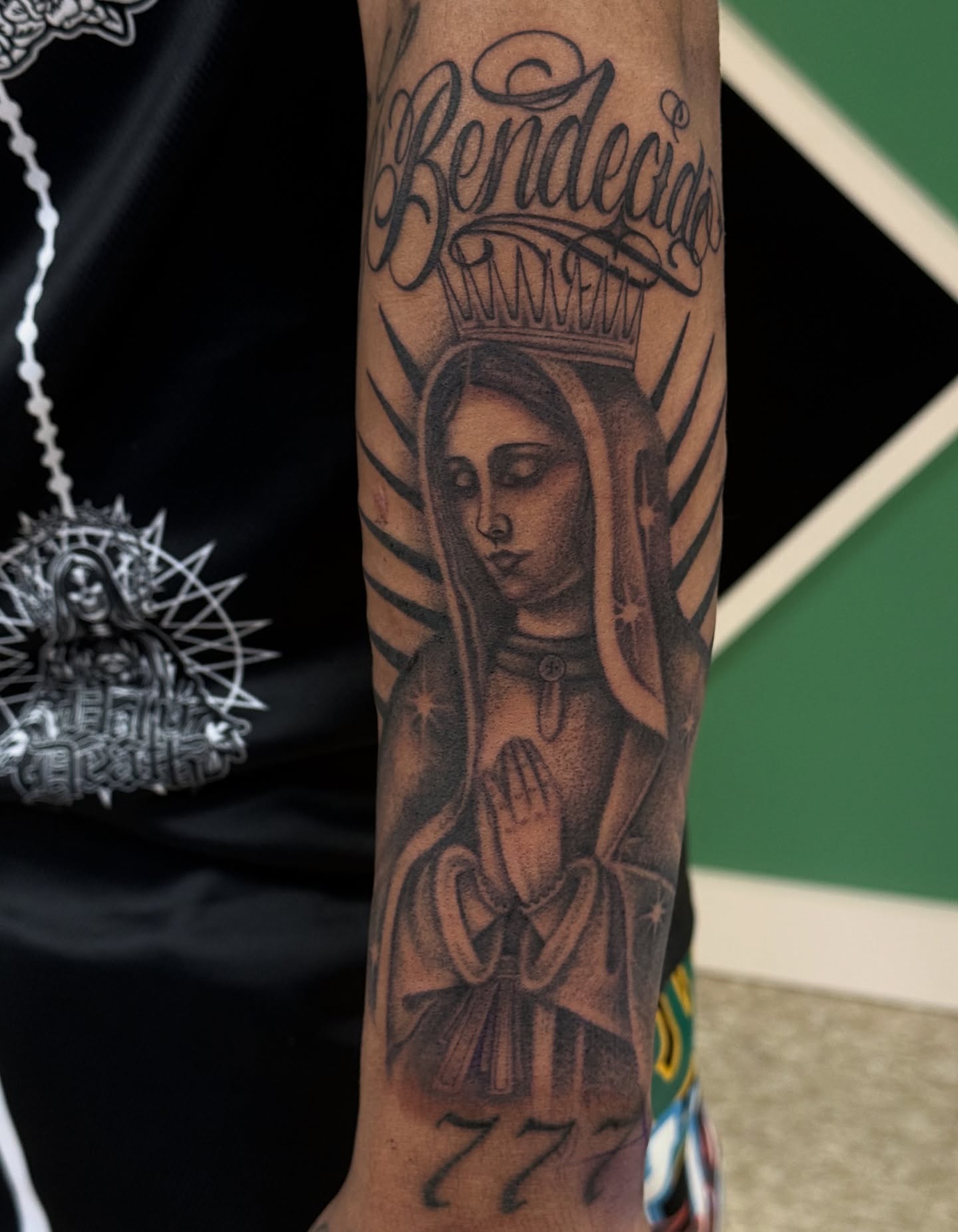 Our Lady of Guadalupe black and grey tattoo on the forearm by Eva, Matawan, New Jersey