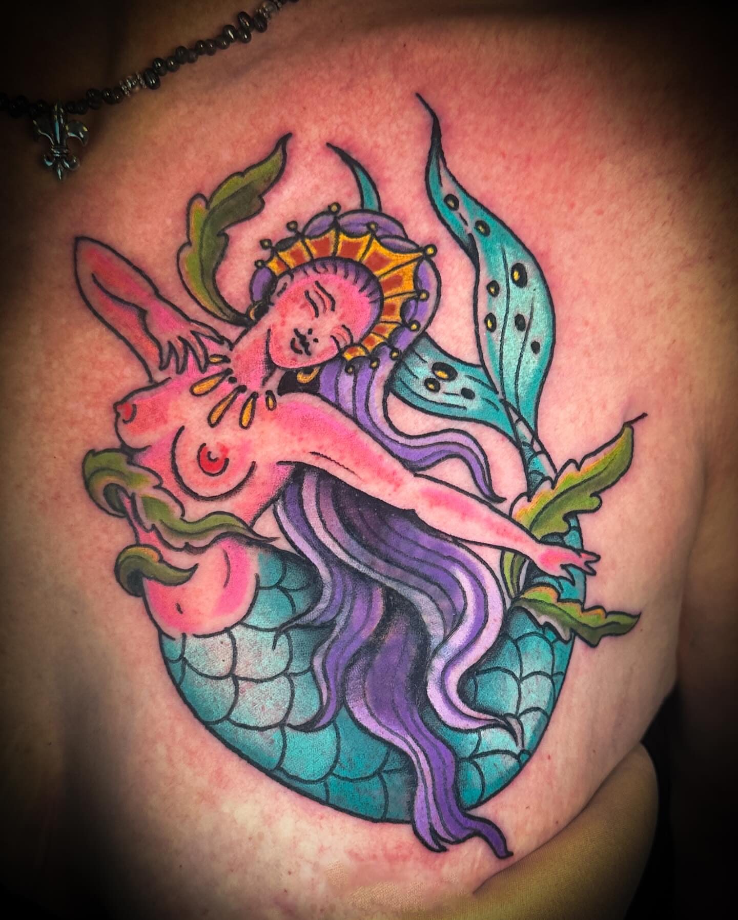 Mermaid American traditional tattoo on the shoulder by Stacey Colangelo