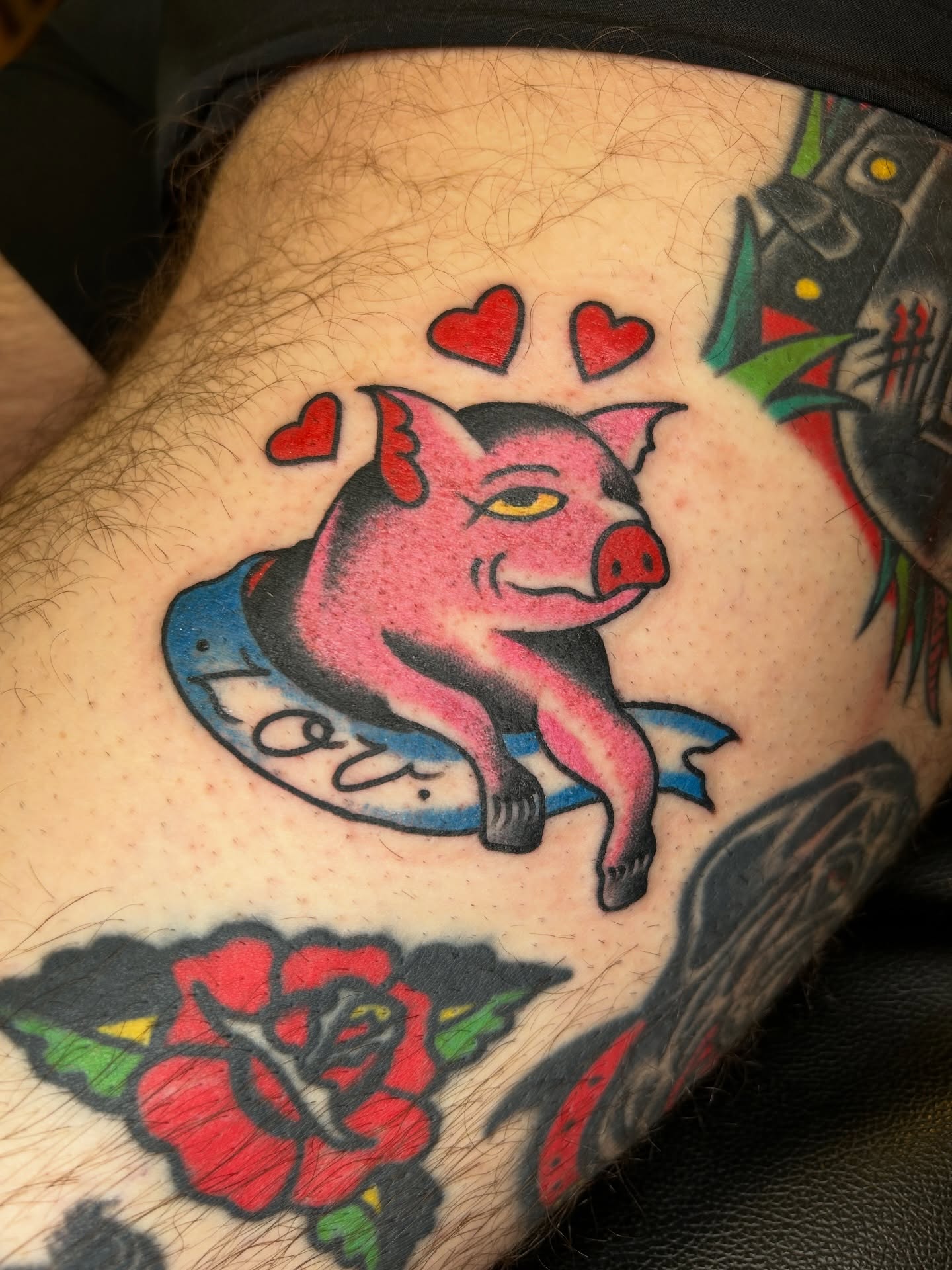 Pig American traditional tattoo on the thigh by Eric Caudill, Indianapolis, Indiana