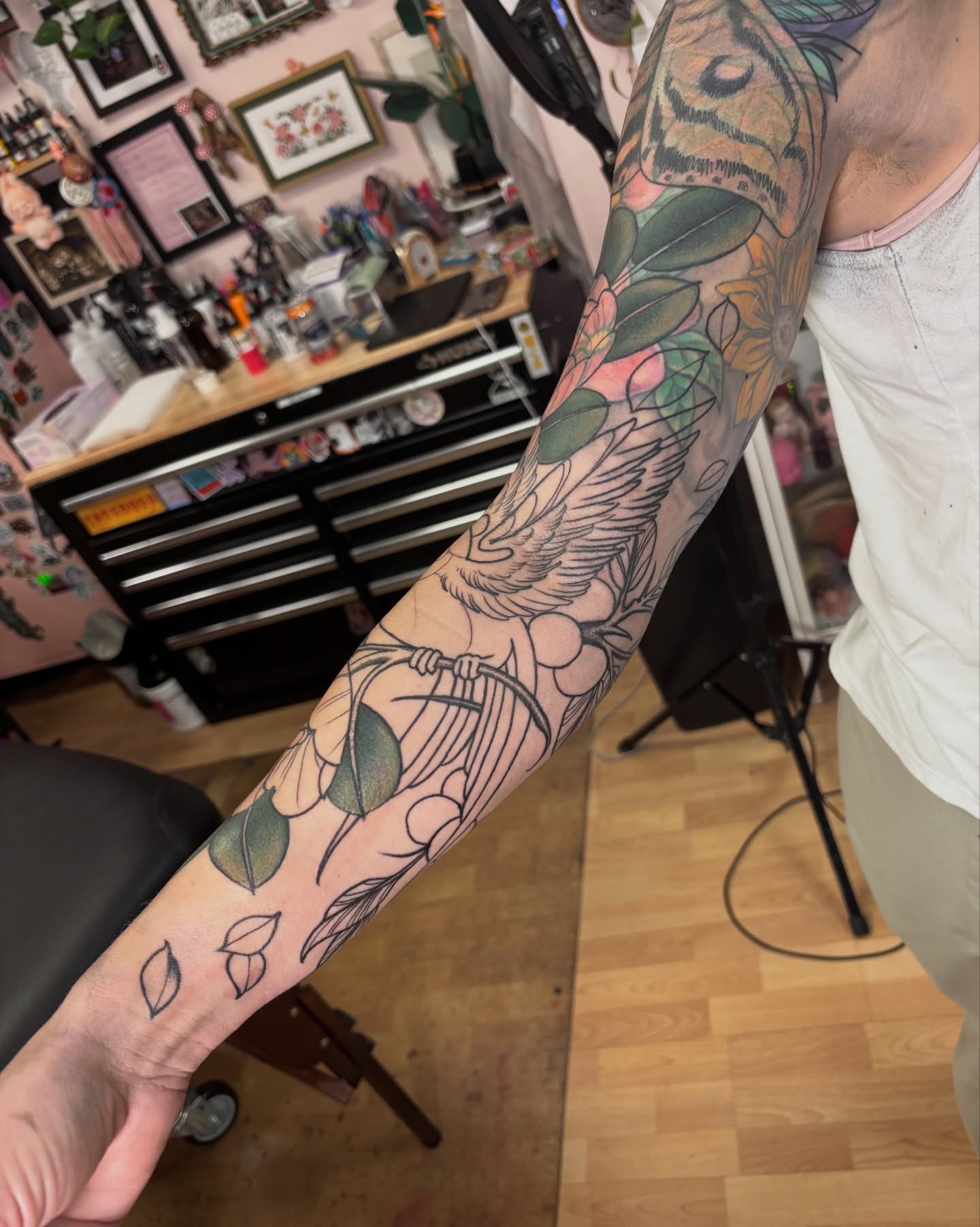 Bird and floral American traditional tattoo on the forearm by π―πππππ