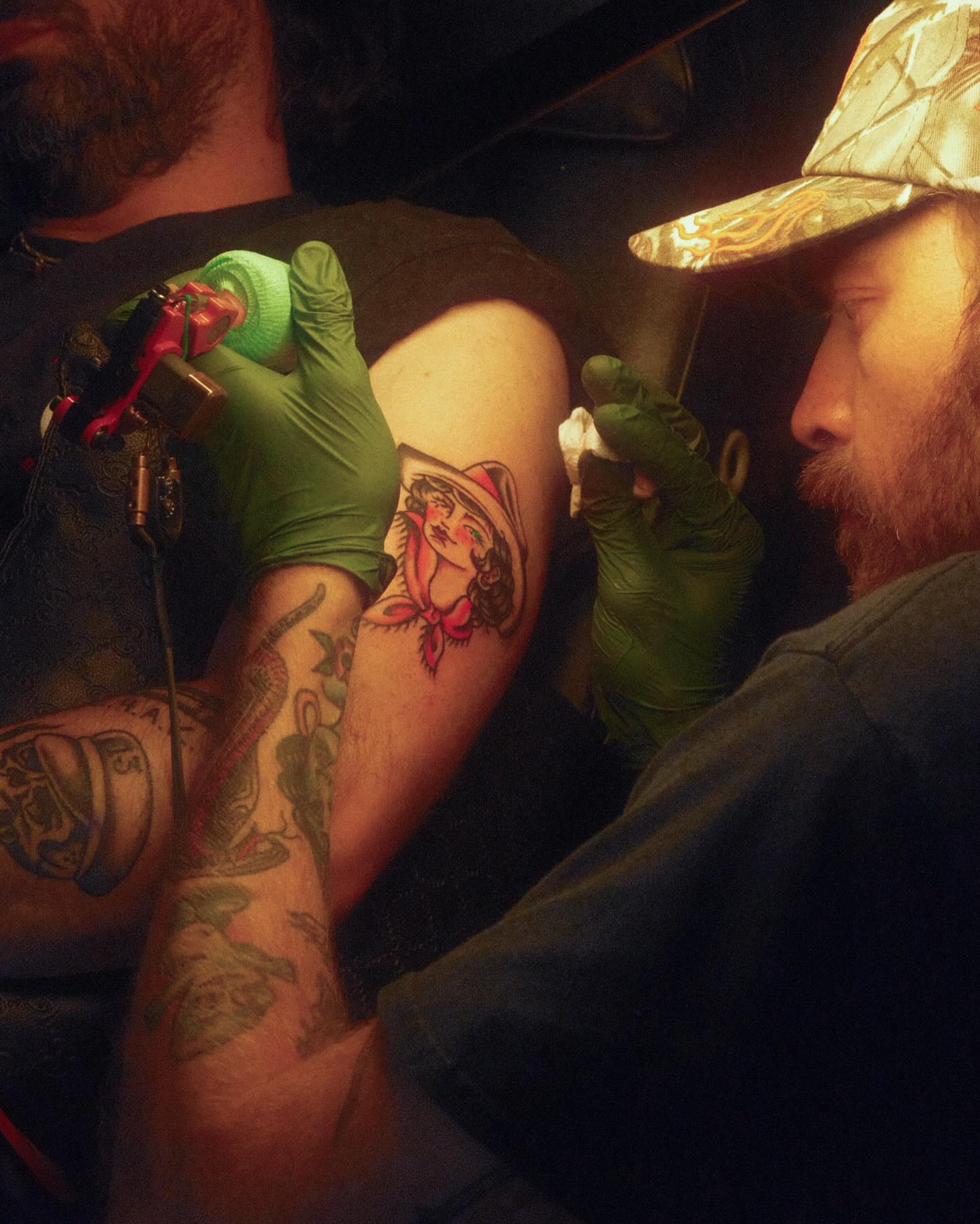 Woman with hat American traditional tattoo on the forearm by Ty Elias