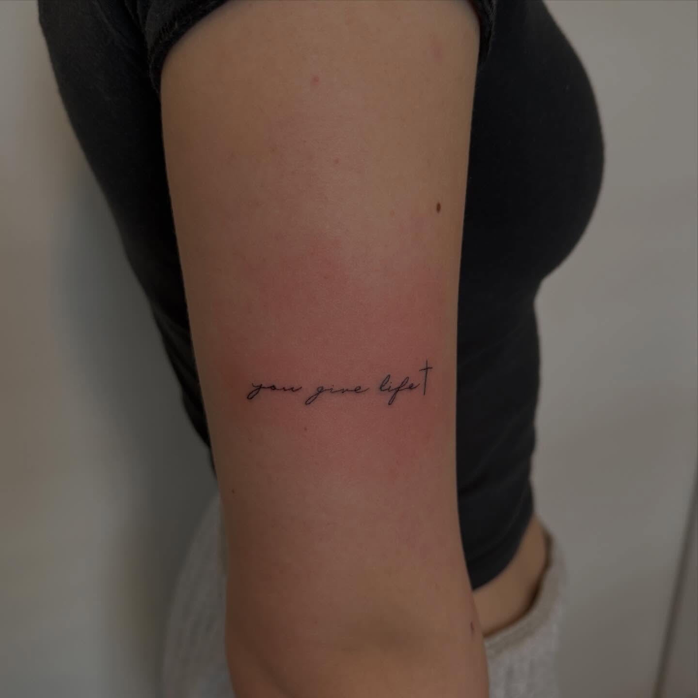 You give life lettering script tattoo on the forearm by Lexie Decker, Canton, Ohio