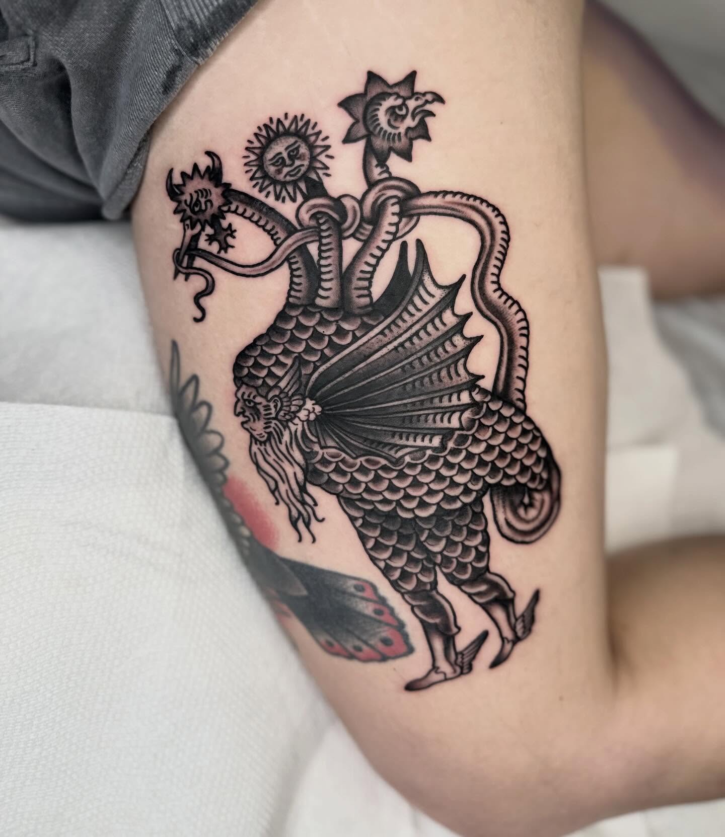 Mythical creature American traditional tattoo on the forearm by mia palau
