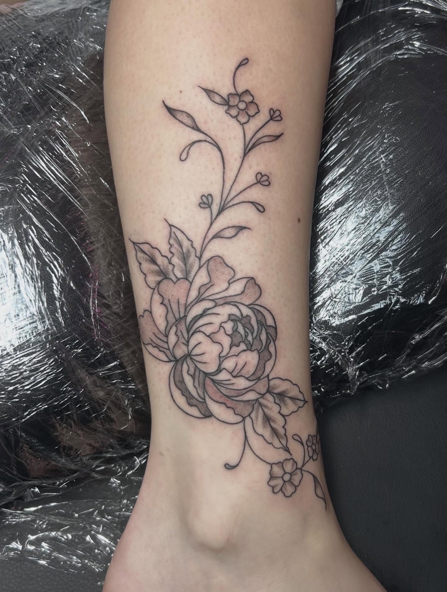 Peony black and grey tattoo on the calf by Red✨, Gansevoort, New York