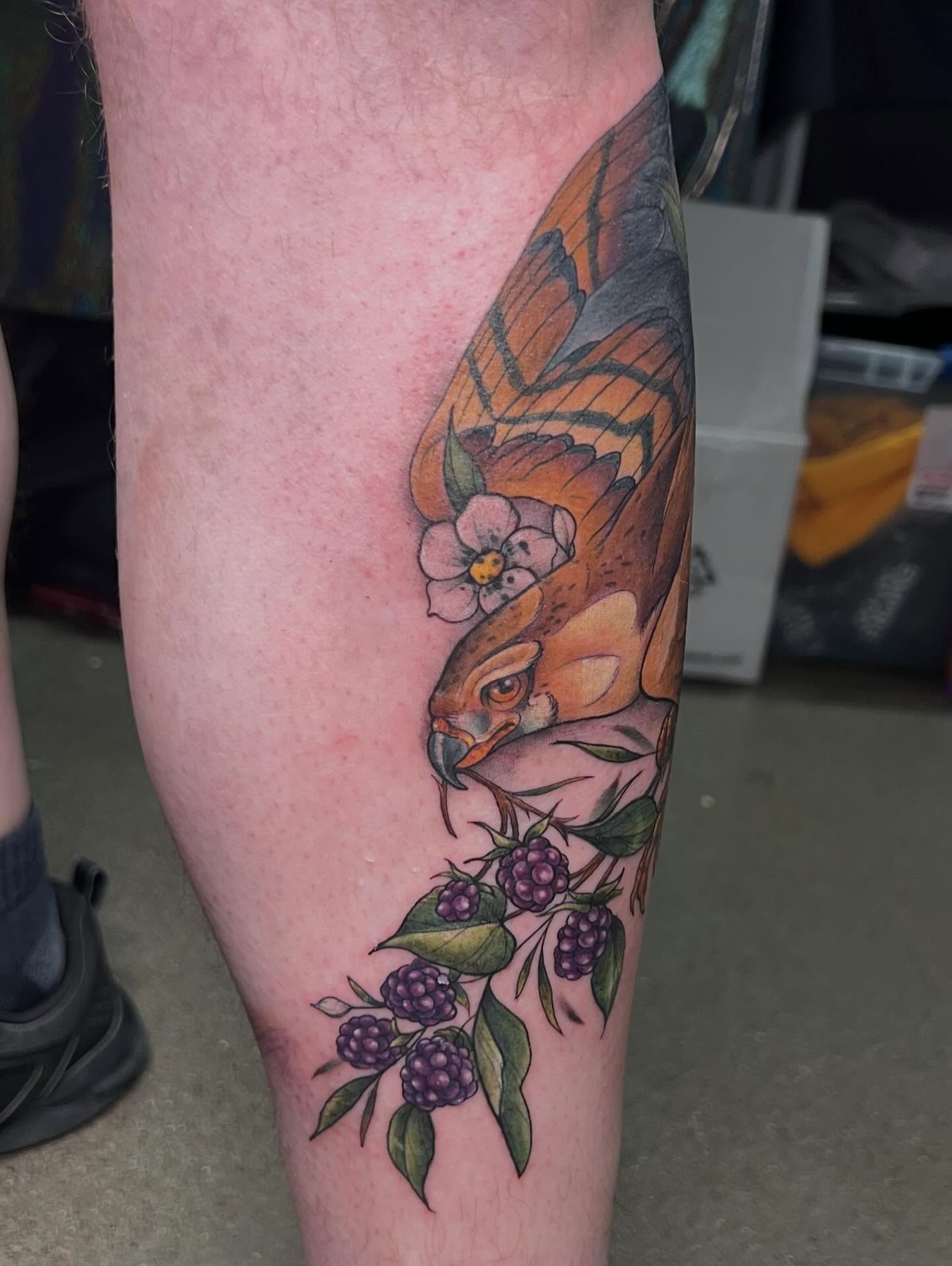 Bird and berries realism tattoo on the forearm by Bailey Goodwin, Ankeny, Iowa
