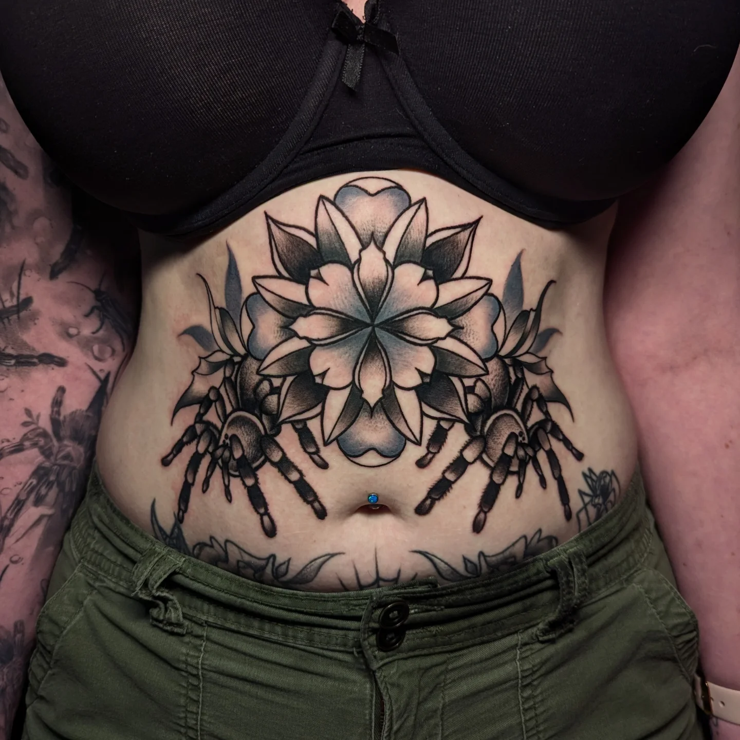 Lotus flower American traditional tattoo on the torso by 𝐈𝐚𝐧 𝐒𝐞𝐭𝐡 🕷️ Austin