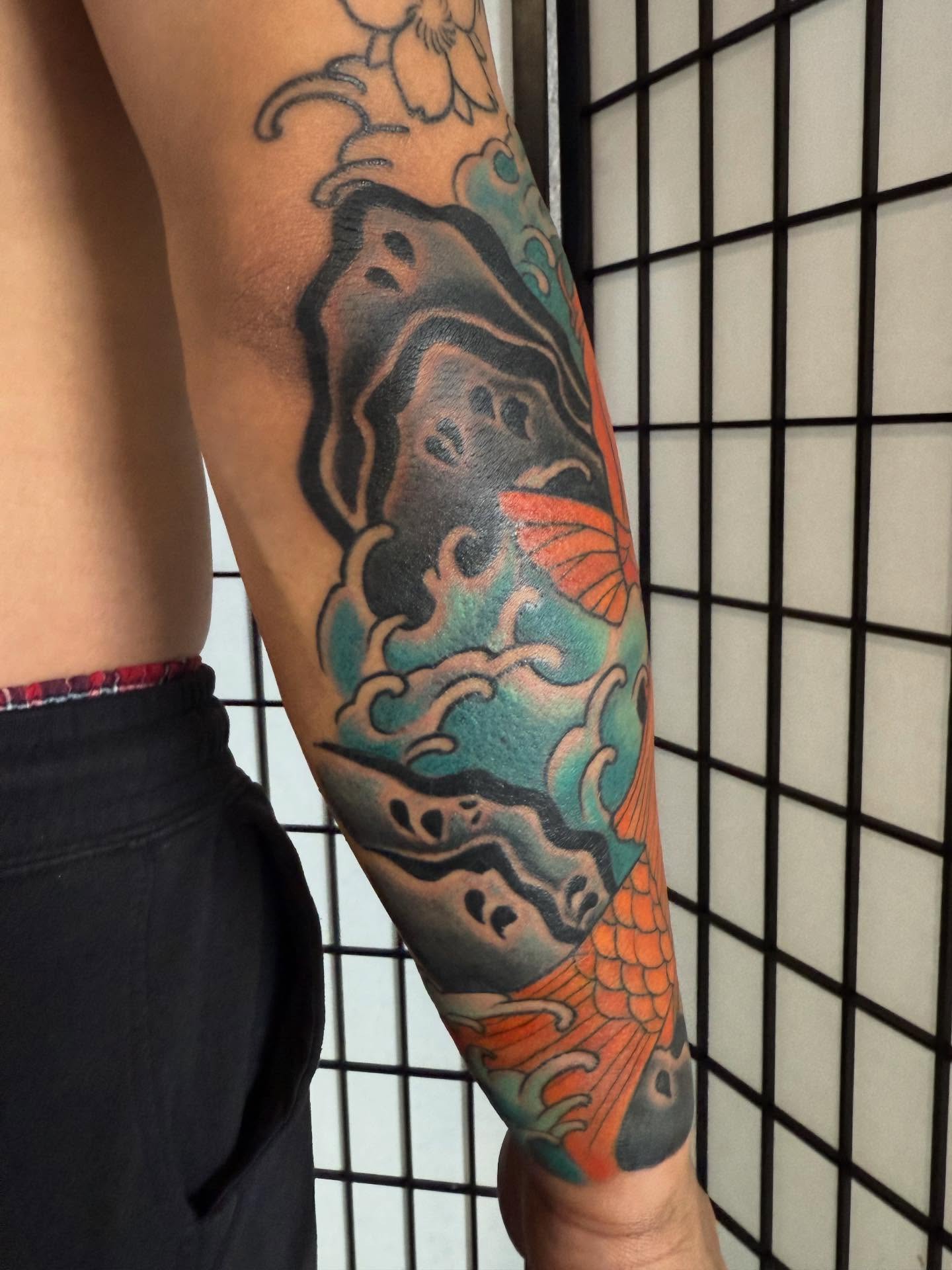 Koi fish japanese irezumi tattoo on the forearm by Randall Croley El