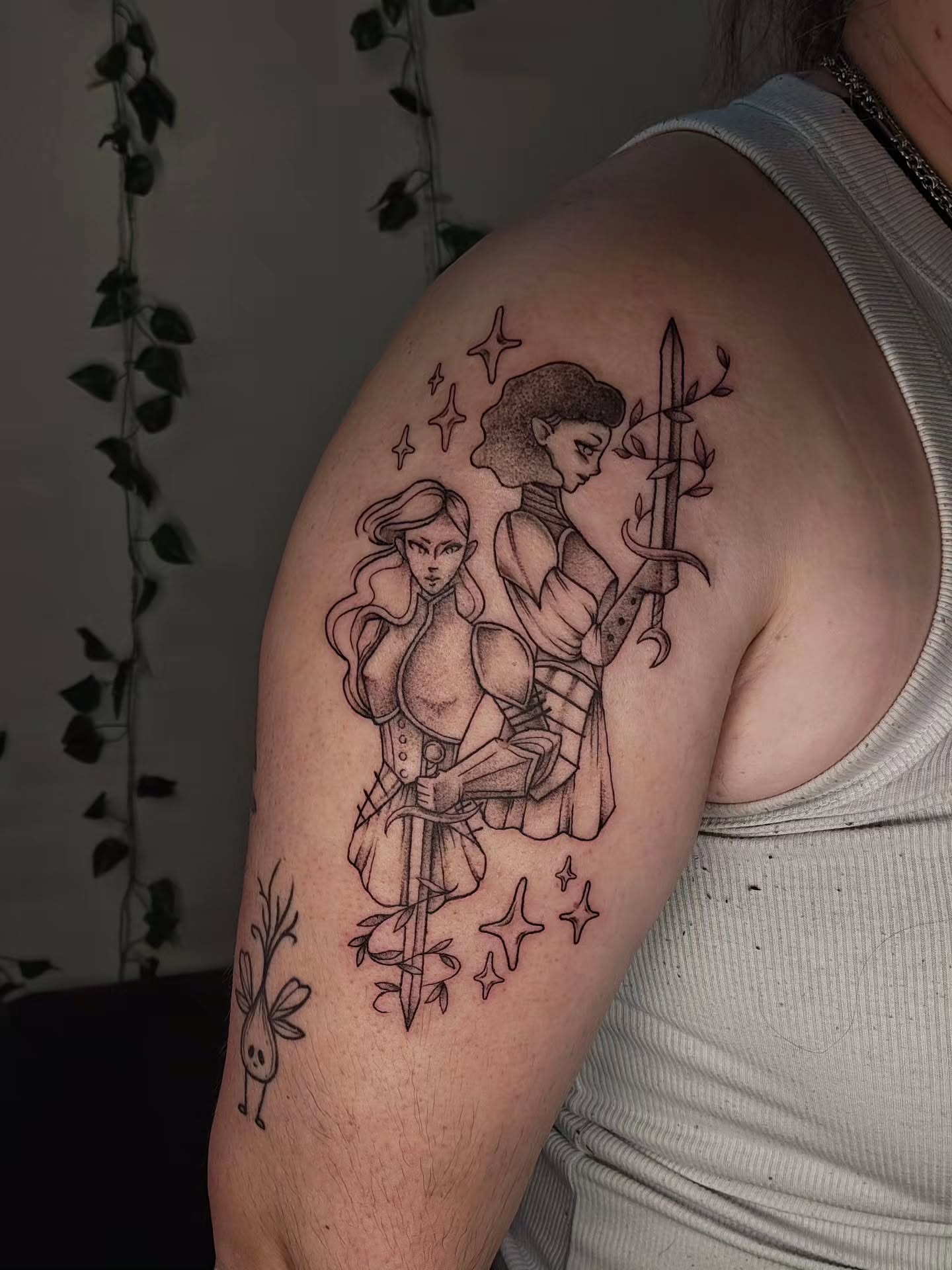 Sword-wielding characters realism tattoo on the shoulder by Luna 🌙