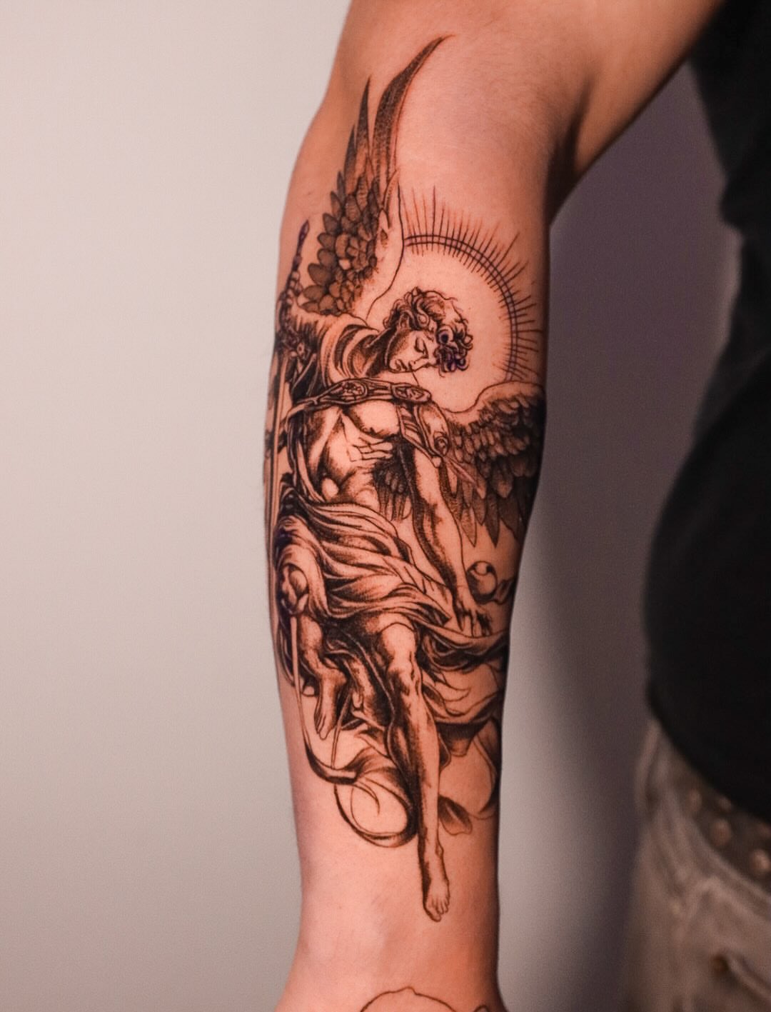 Angel black and grey tattoo on the forearm by elvis flores