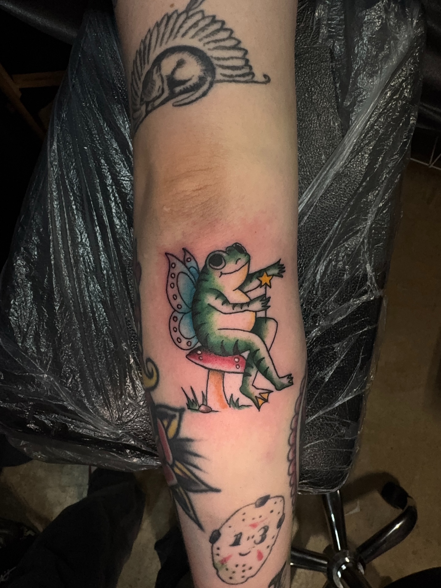 Frog fairy American traditional tattoo on the forearm by Nathalie Briseno