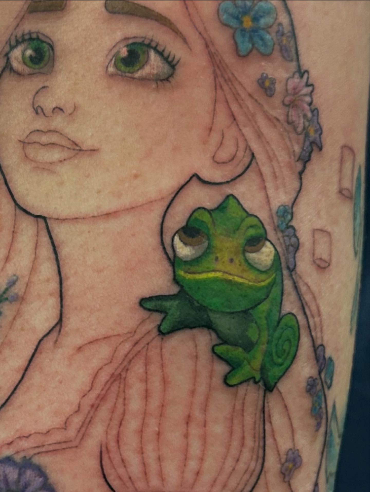 Frog realism tattoo on the forearm by Mayhem Andrews