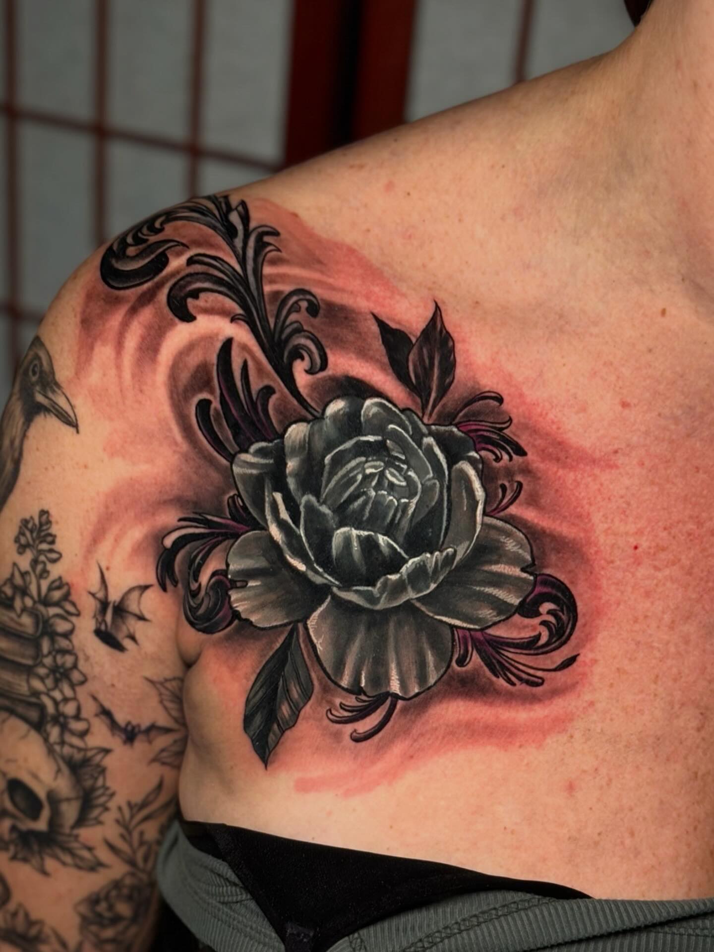 Black peony black and grey tattoo on the shoulder by Johnny Scillieri