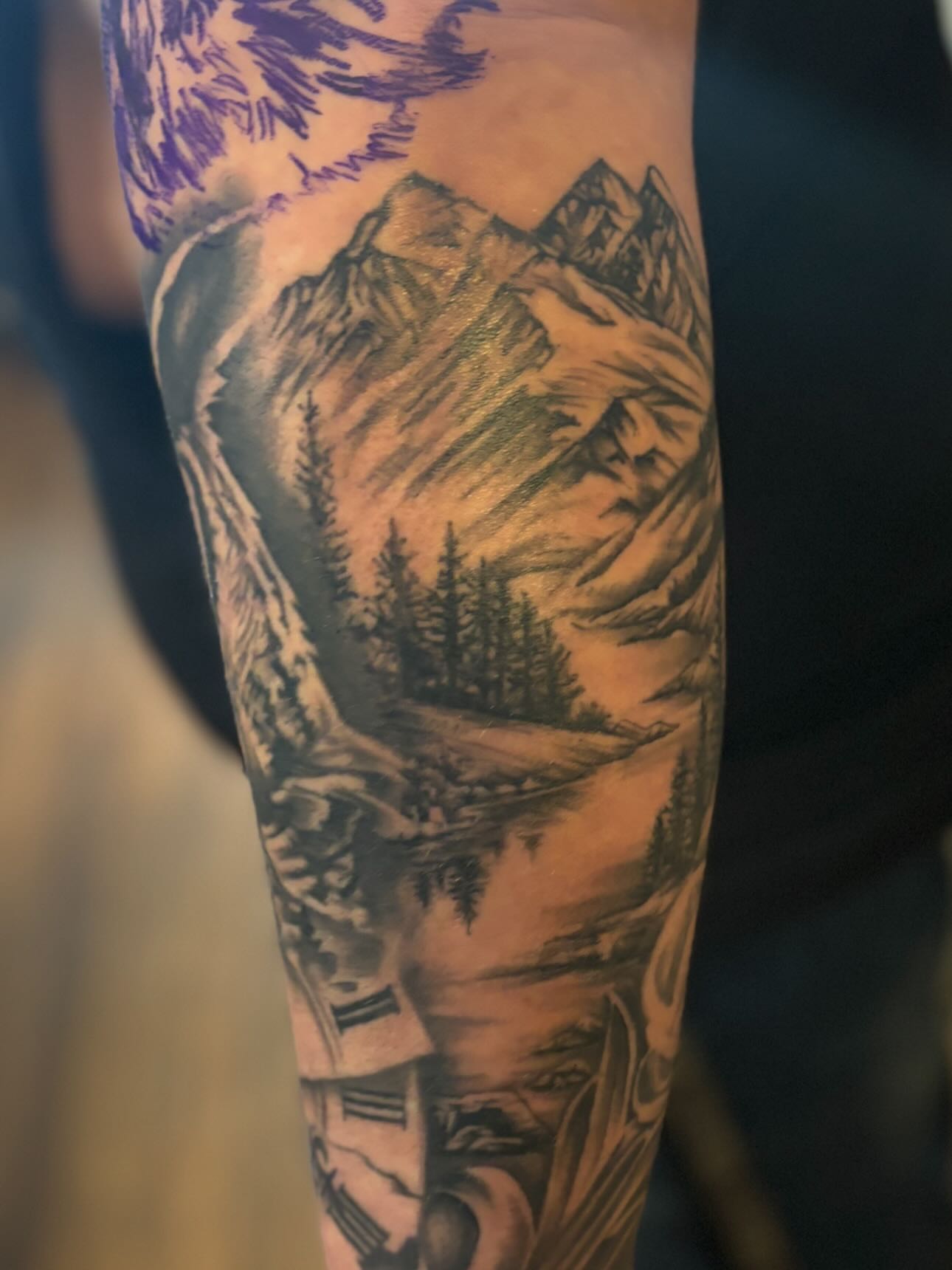 Mountain landscape realism tattoo on the forearm by Jesus Pubert Munster
