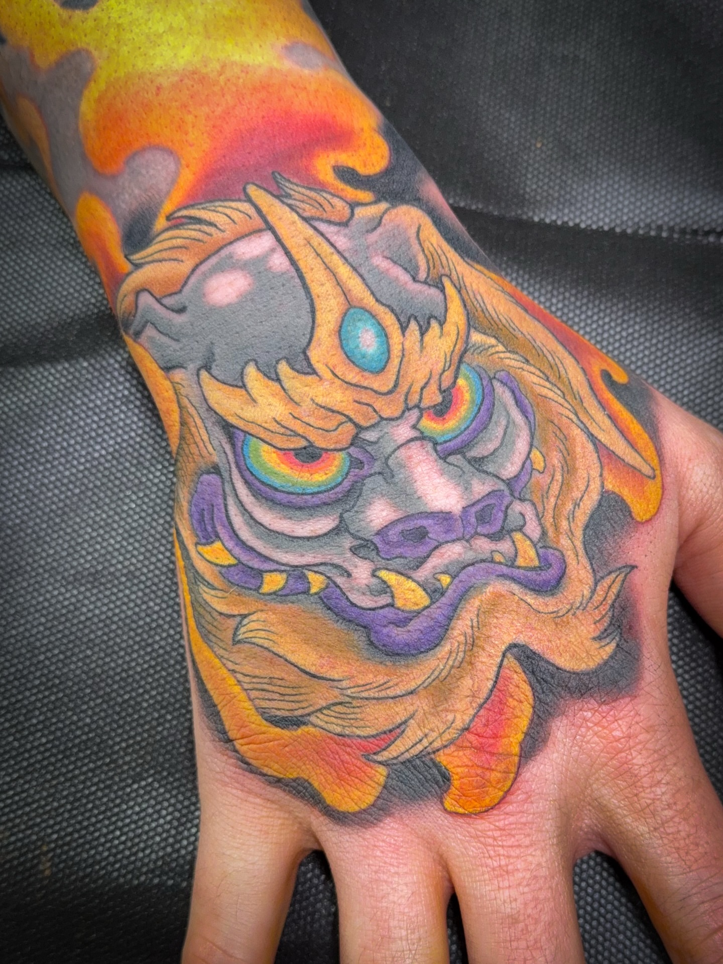 Mask japanese irezumi tattoo on the hand by James Bird, Vancouver, British Columbia