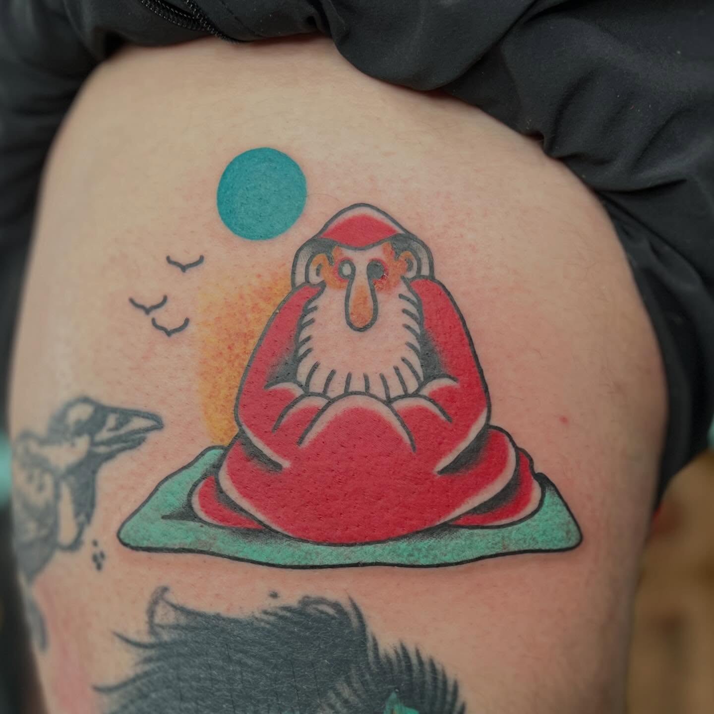 Monkey meditating American traditional tattoo on the thigh by Mikey Montoya