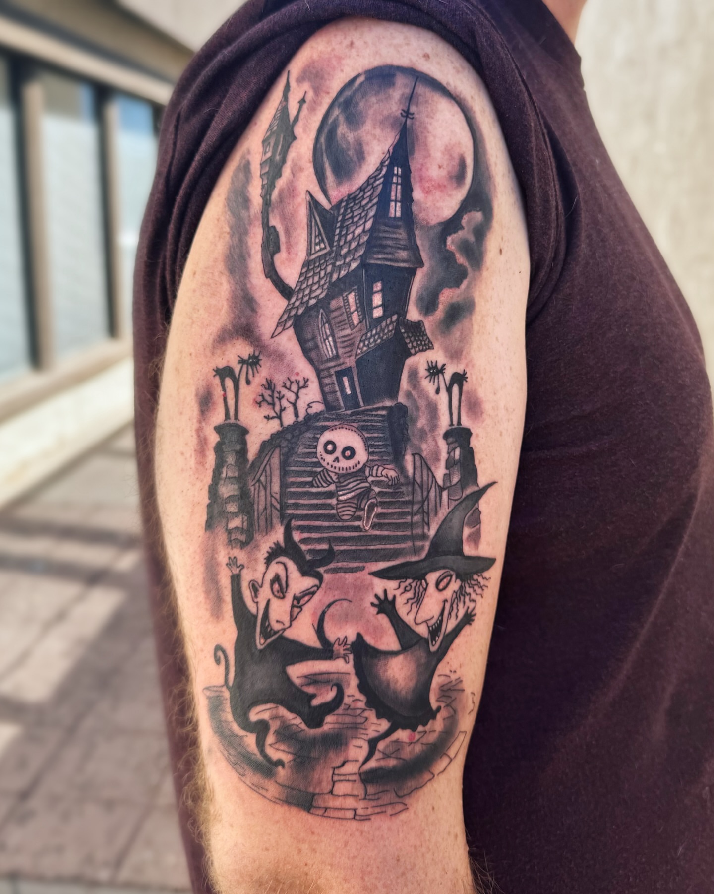 Haunted house dark realism tattoo on the shoulder by Kate