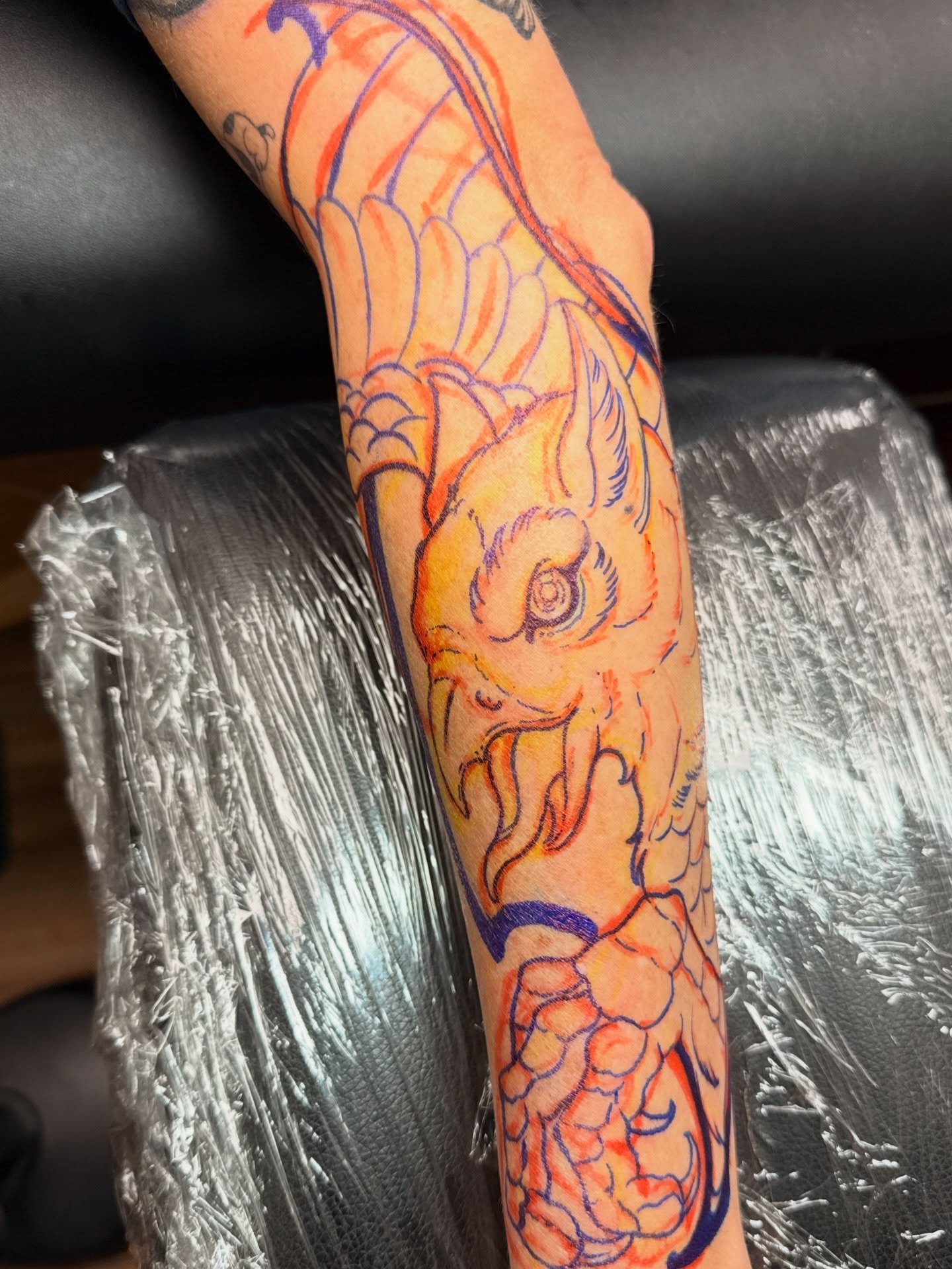 Koi fish japanese irezumi tattoo on the forearm by Dave Osrowitz