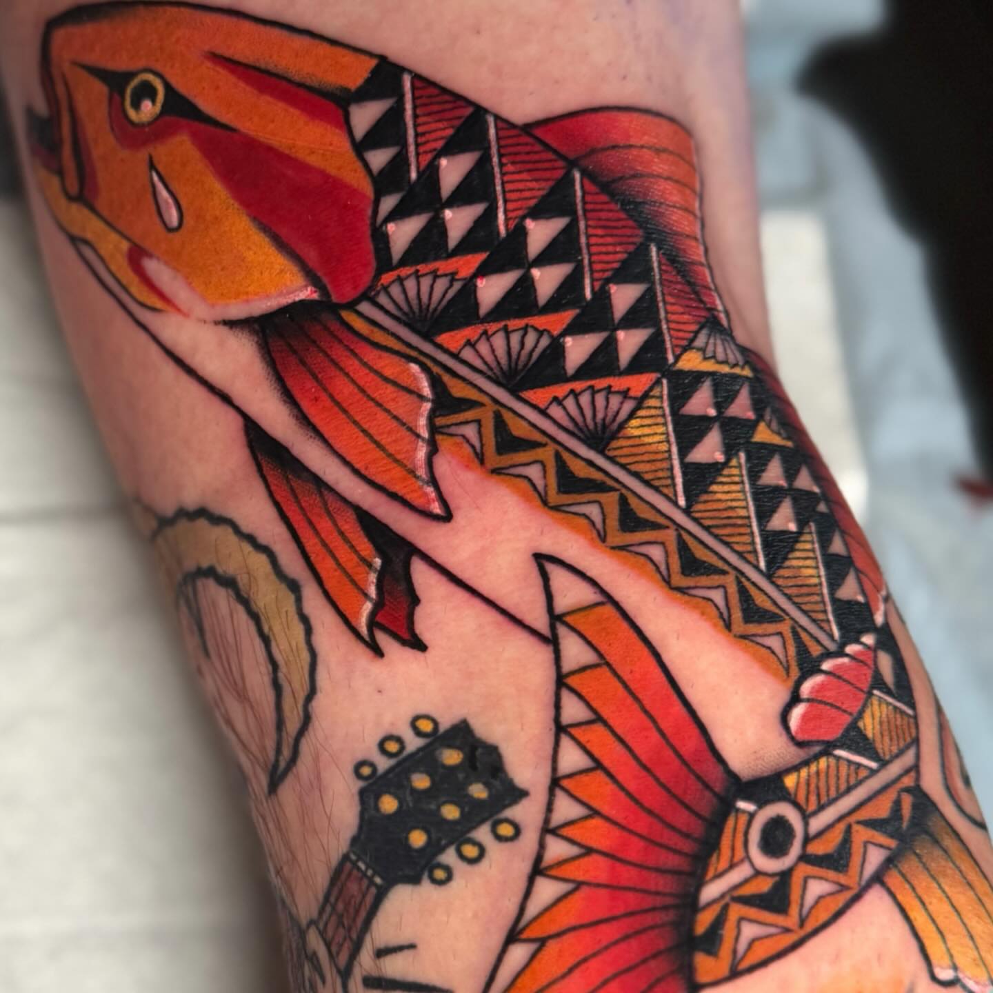Fish American traditional tattoo on the forearm by Dylan Walker
