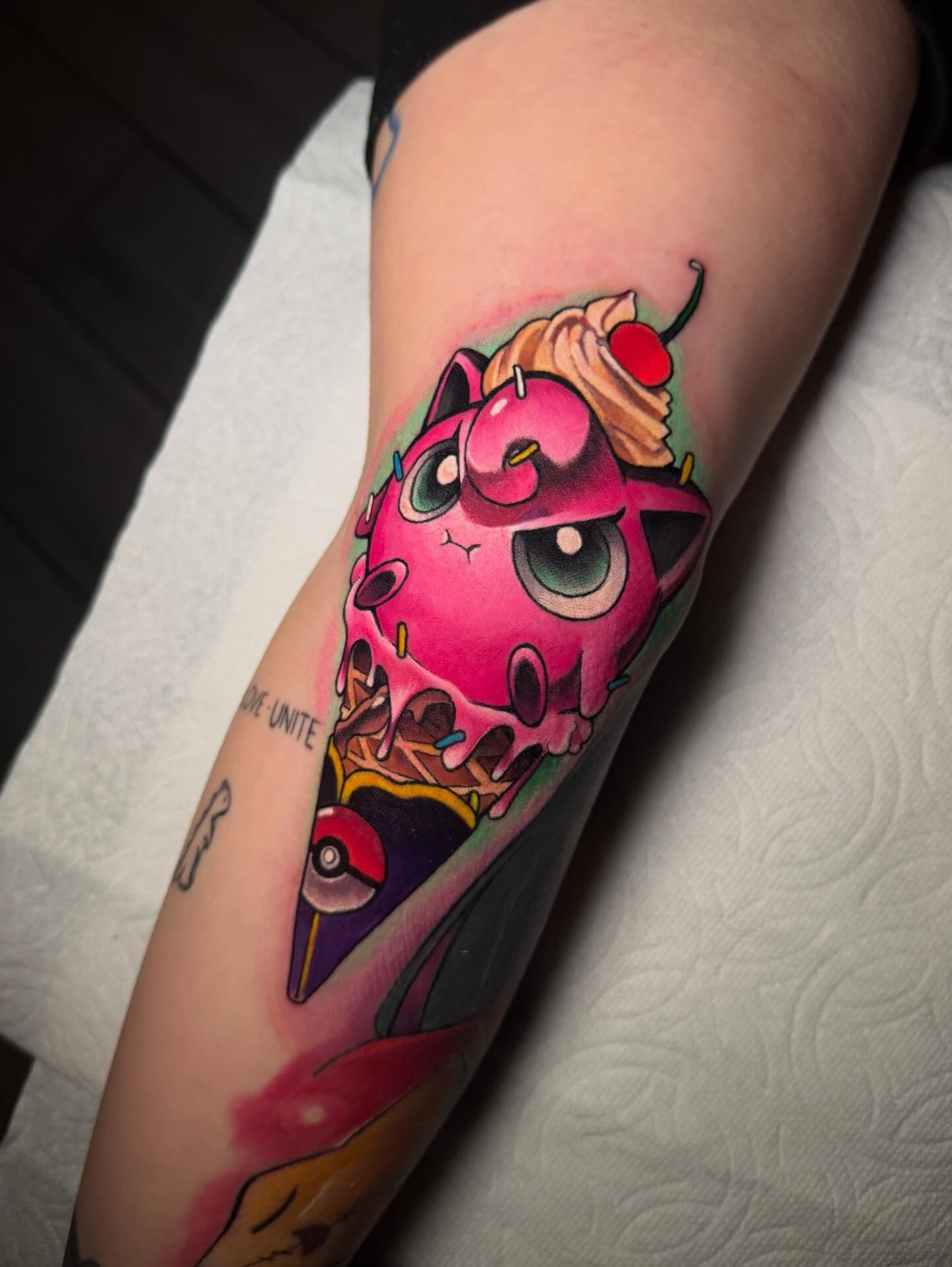 Ice cream cone new school tattoo on the forearm by Kenneth Ruiz