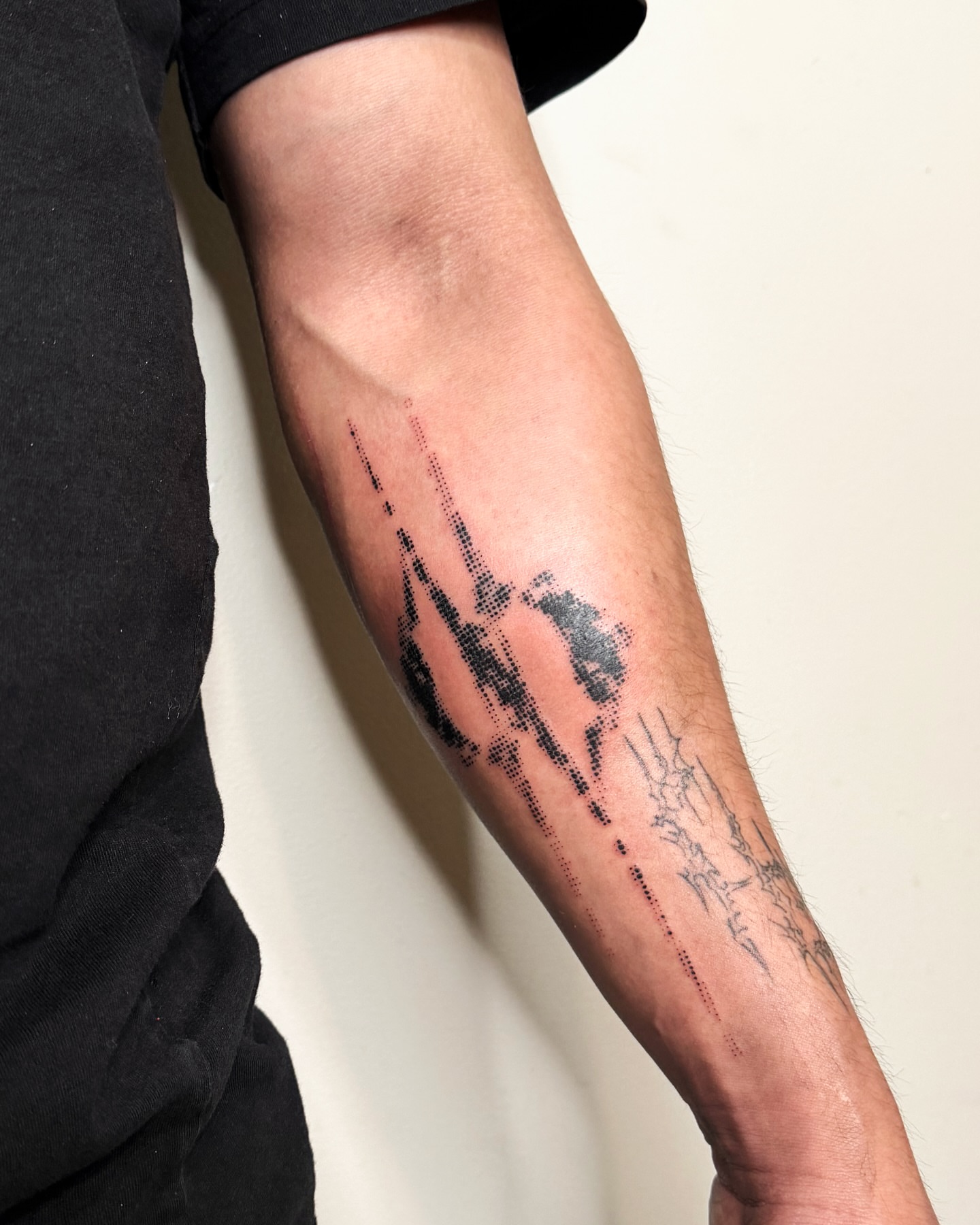 Mountain climber dotwork tattoo on the forearm by Haza
