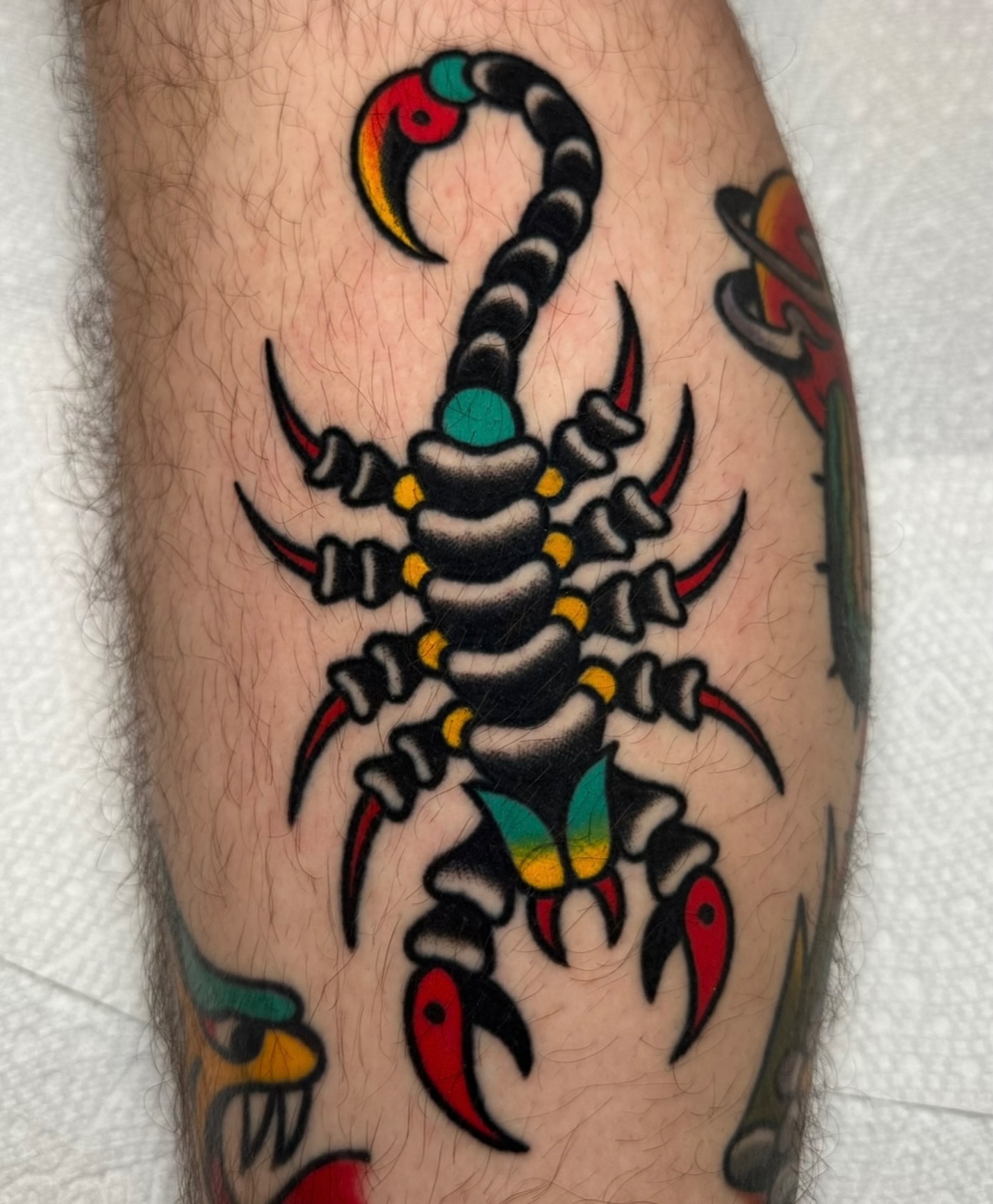 Scorpion American traditional tattoo on the forearm by Zahra Niedermann