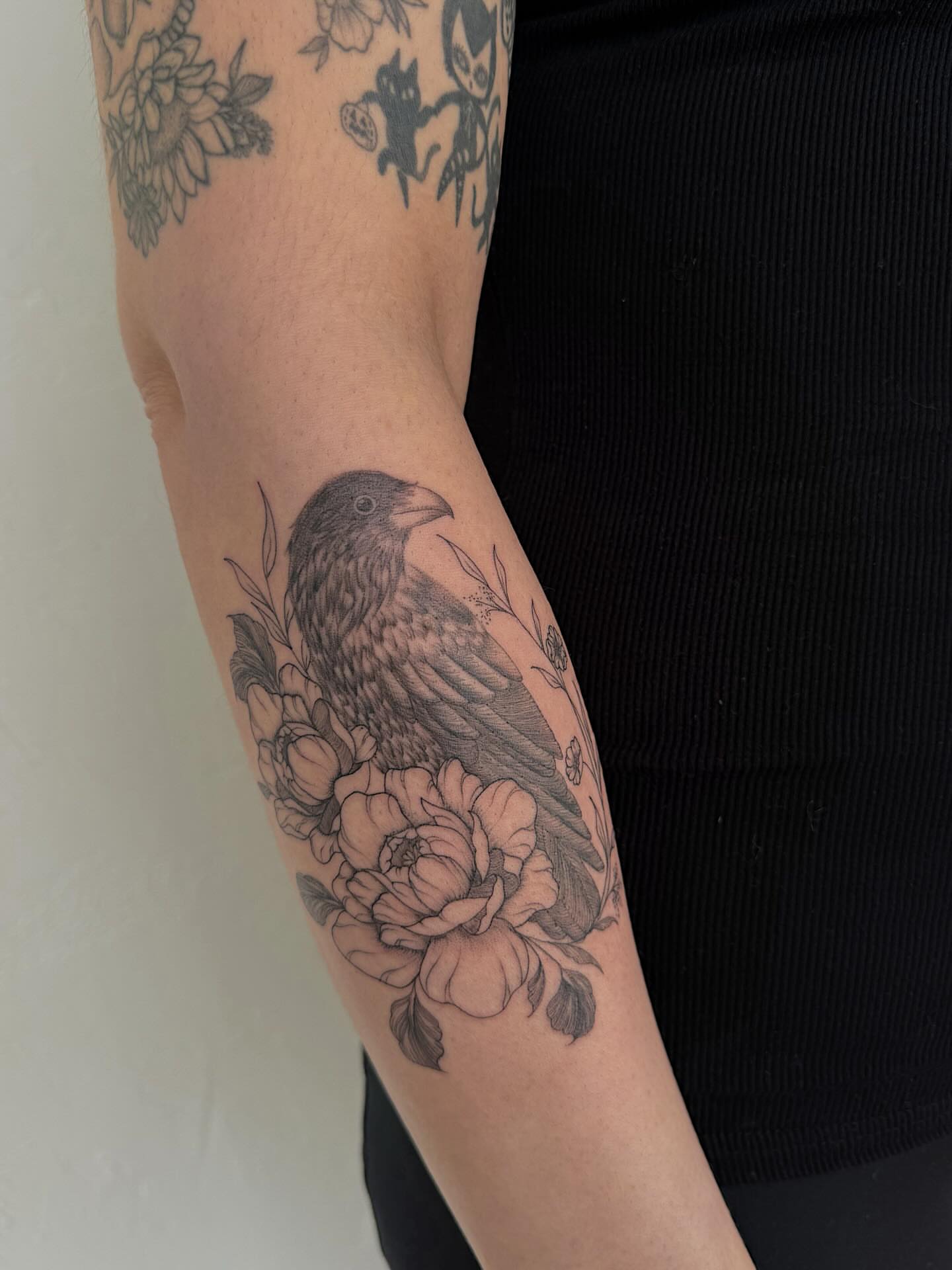 Bird and flowers realism tattoo on the forearm by Shelby Lynn Bayles, Ogden, Utah