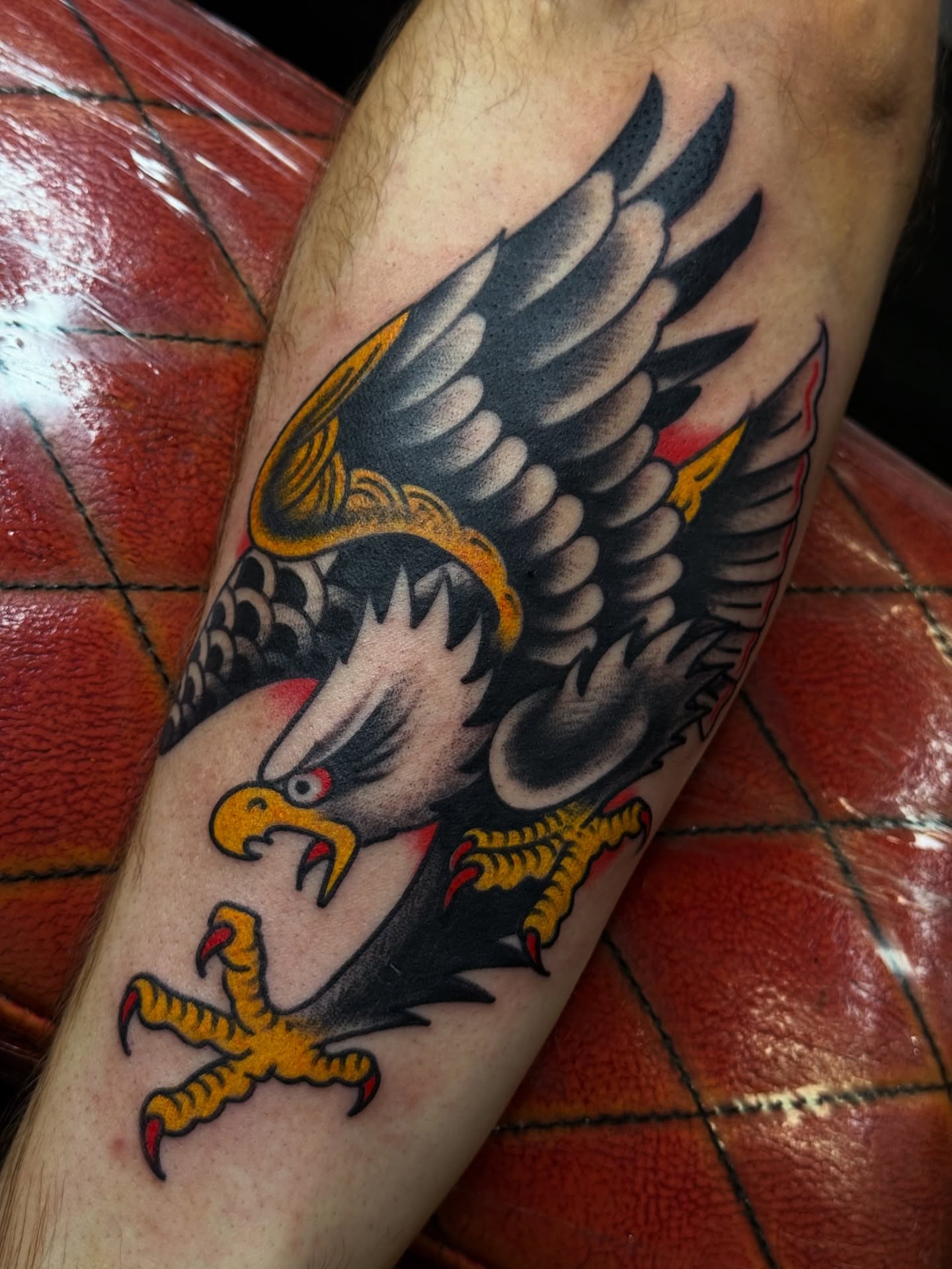 Eagle American traditional tattoo on the forearm by Ben Karnofsky