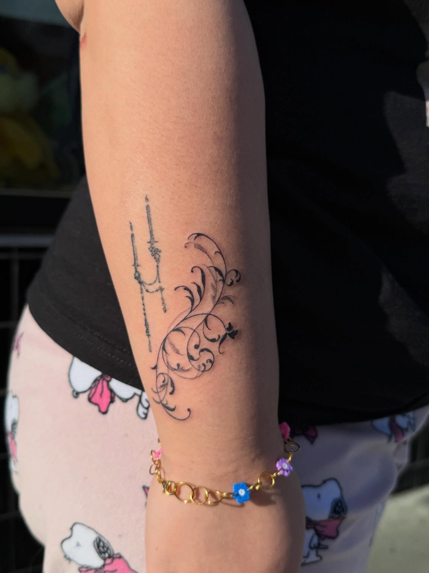 Scrollwork and dagger black and grey tattoo on the forearm by Rachel ˚⊱🪷⊰˚ 芷若, Des Moines, Iowa