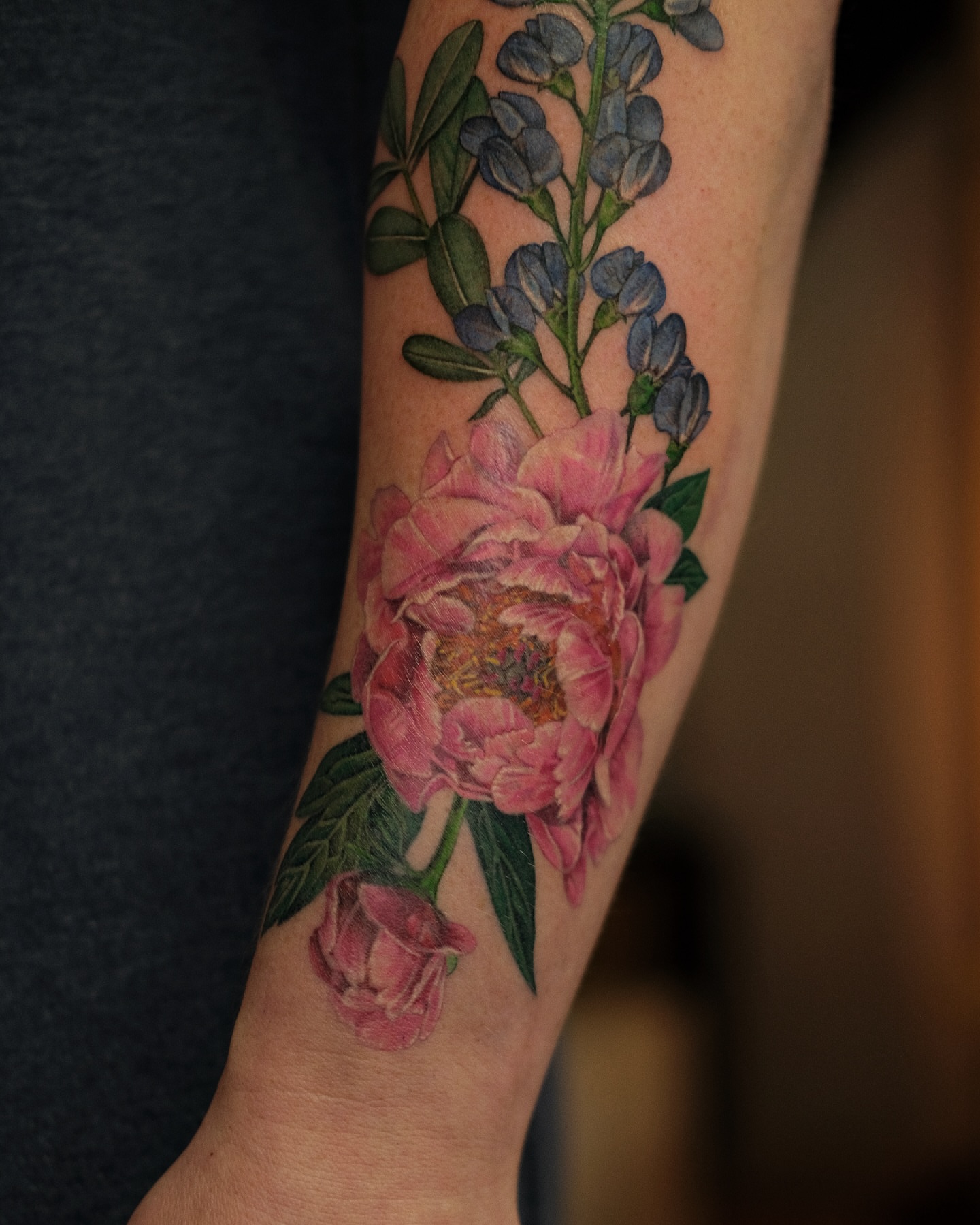 Peony and bluebonnet realism tattoo on the forearm by Jiemin Lin
