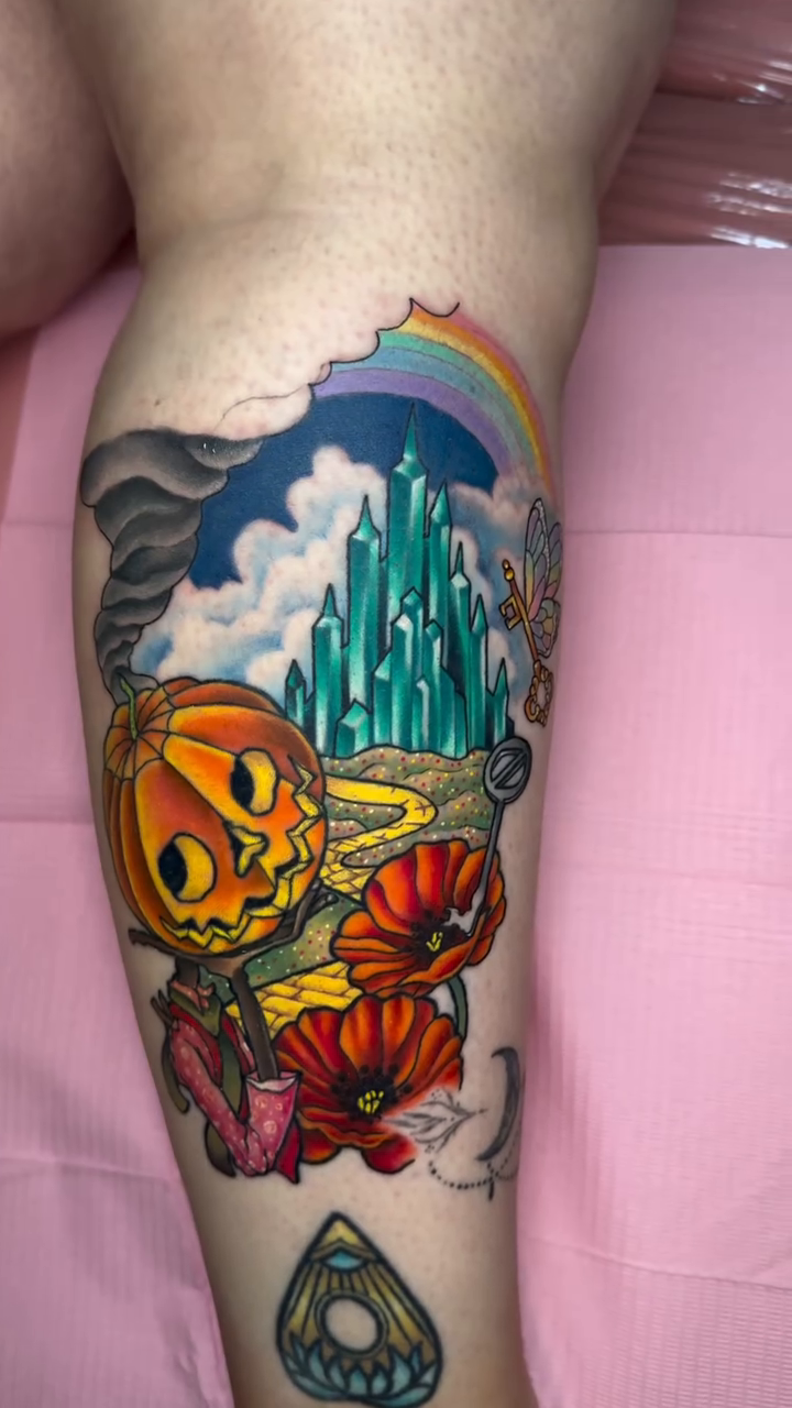 Watercolor tattoo on the forearm by Erin Peterson