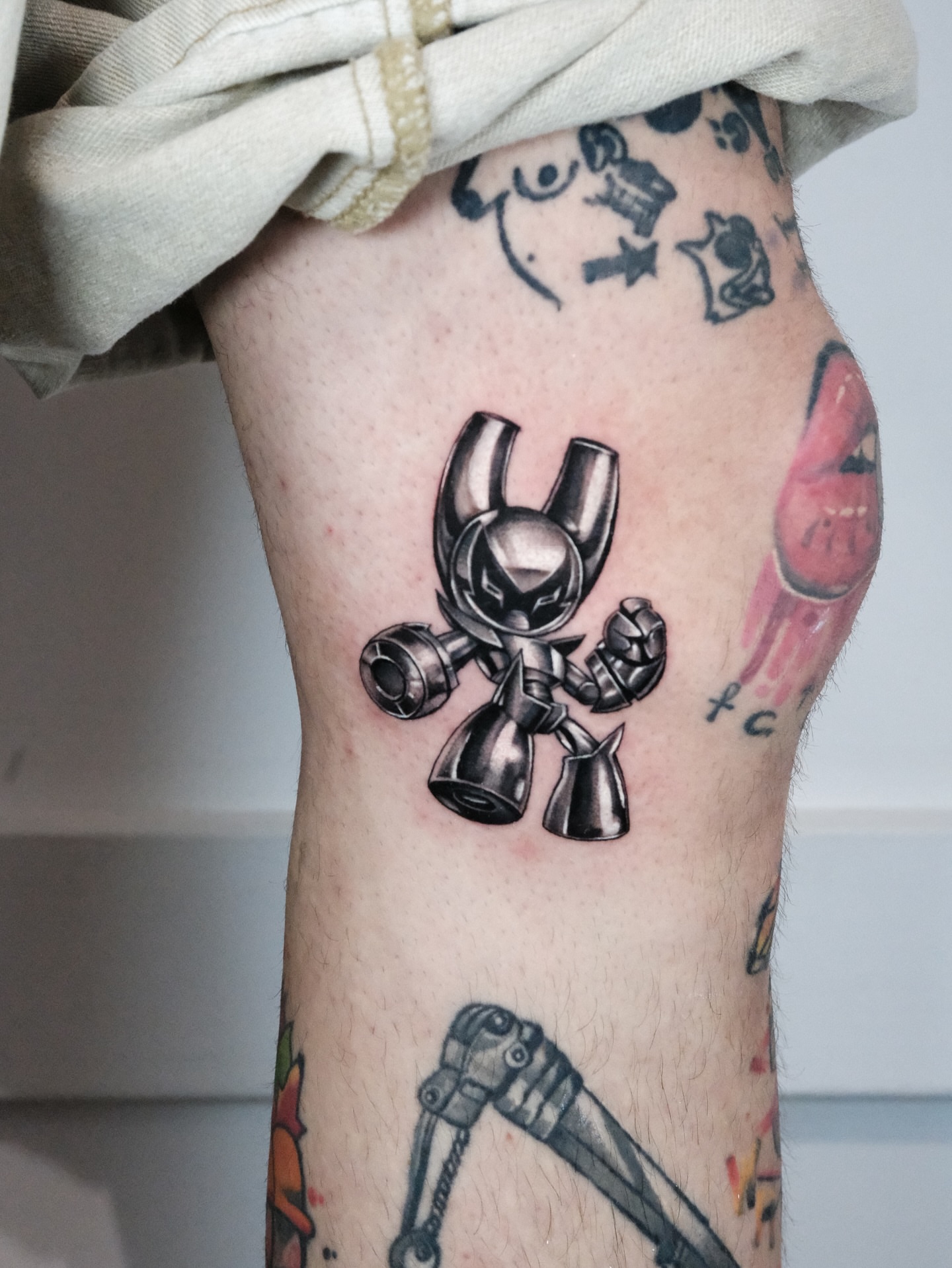 Mecha robot black and grey tattoo on the forearm by Bay Area Tattoo Artist