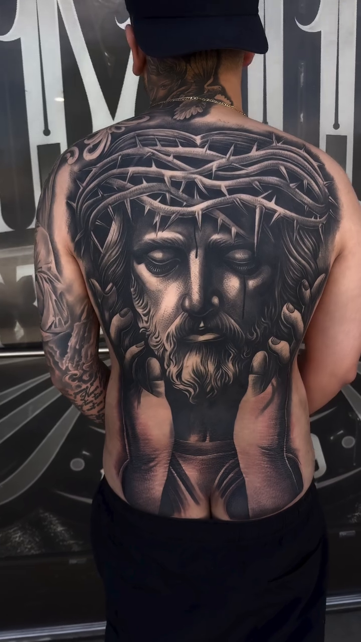 Jesus Christ with crown of thorns realism tattoo by Tattoo