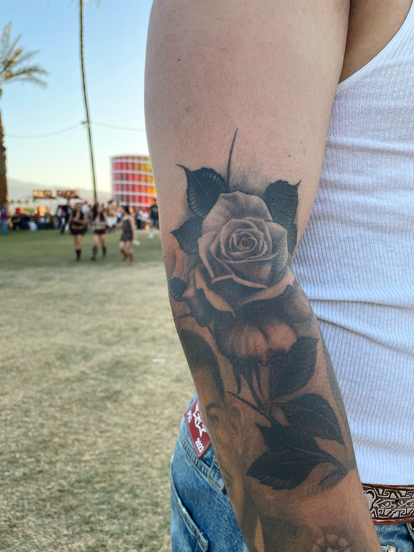 Rose black and grey tattoo on the forearm by Alex Ortiz