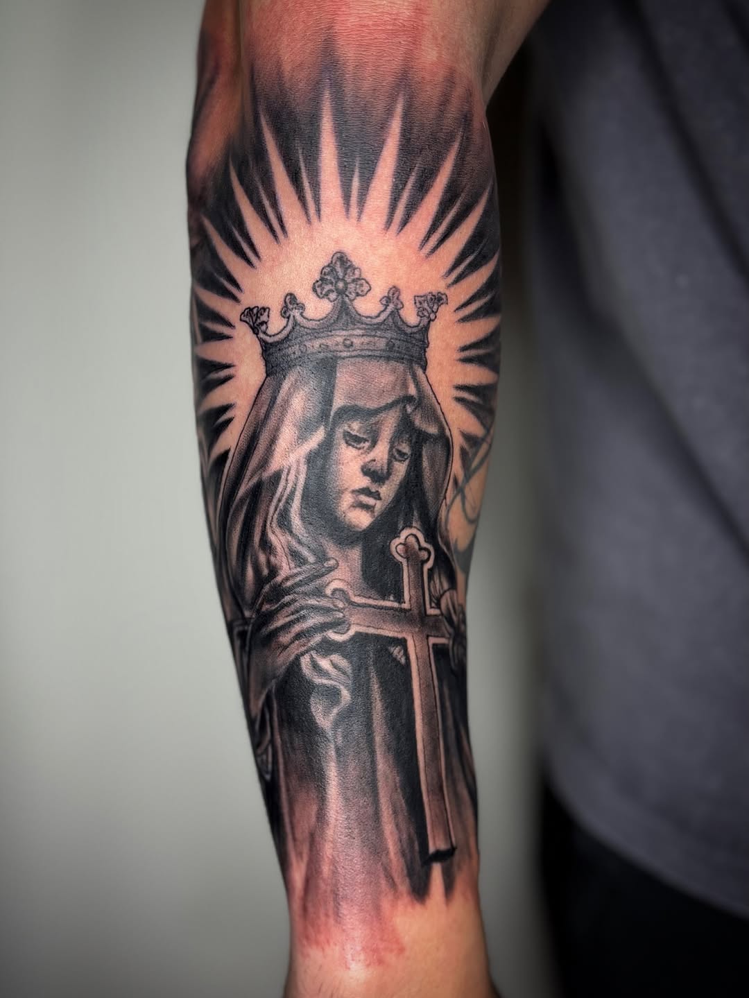 Virgin Mary with crown and cross realism tattoo on the forearm by Adrian Ram 🇬🇾🇵🇭