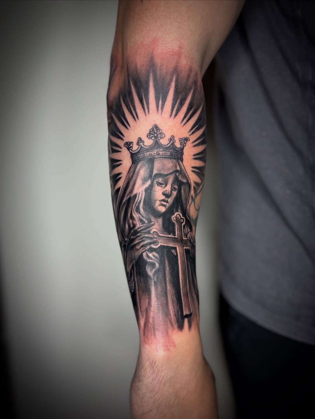 Virgin Mary with crown and cross realism tattoo on the forearm by Adrian Ram 🇬🇾🇵🇭