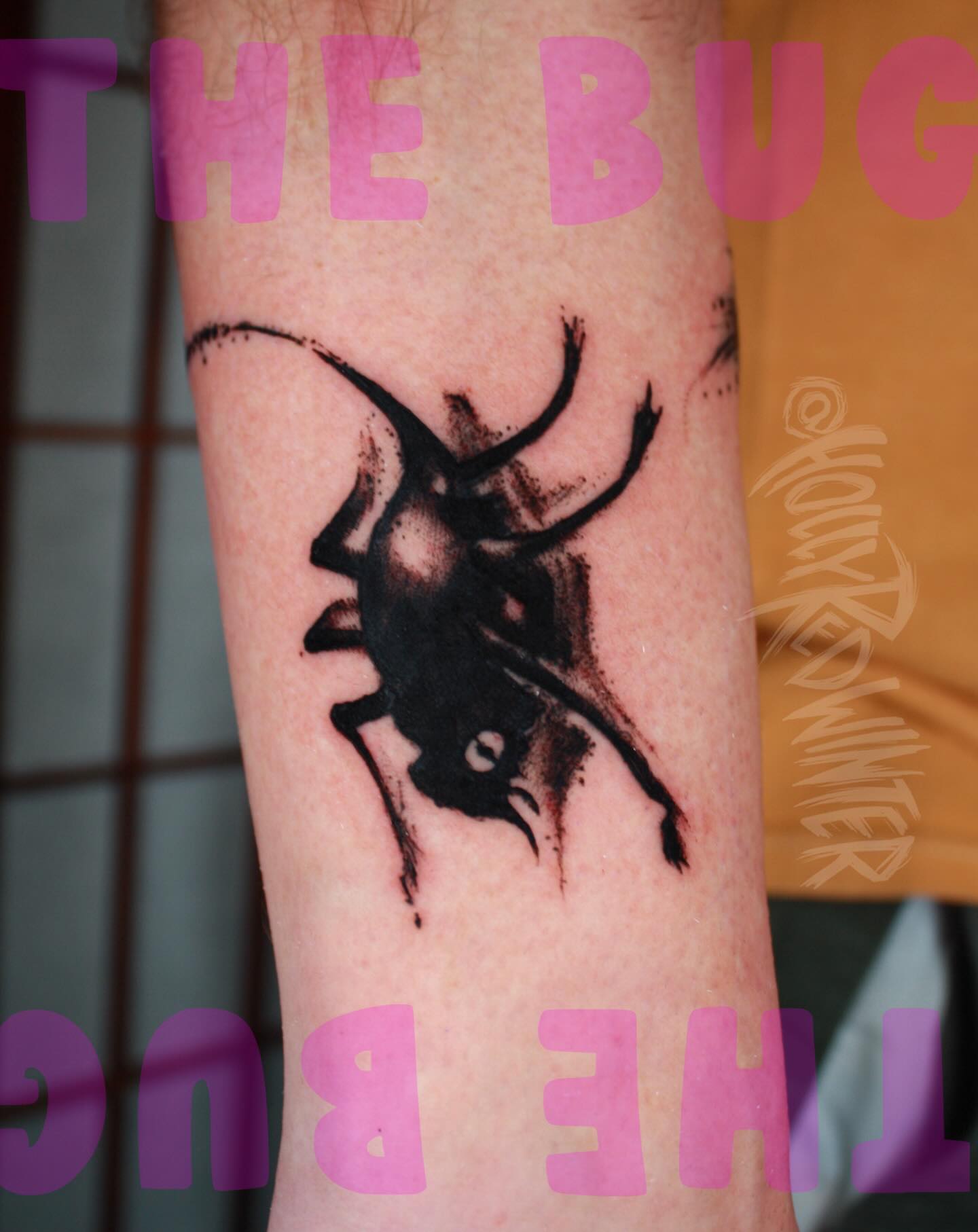 Bug black and grey tattoo on the forearm by Holly Redwinter