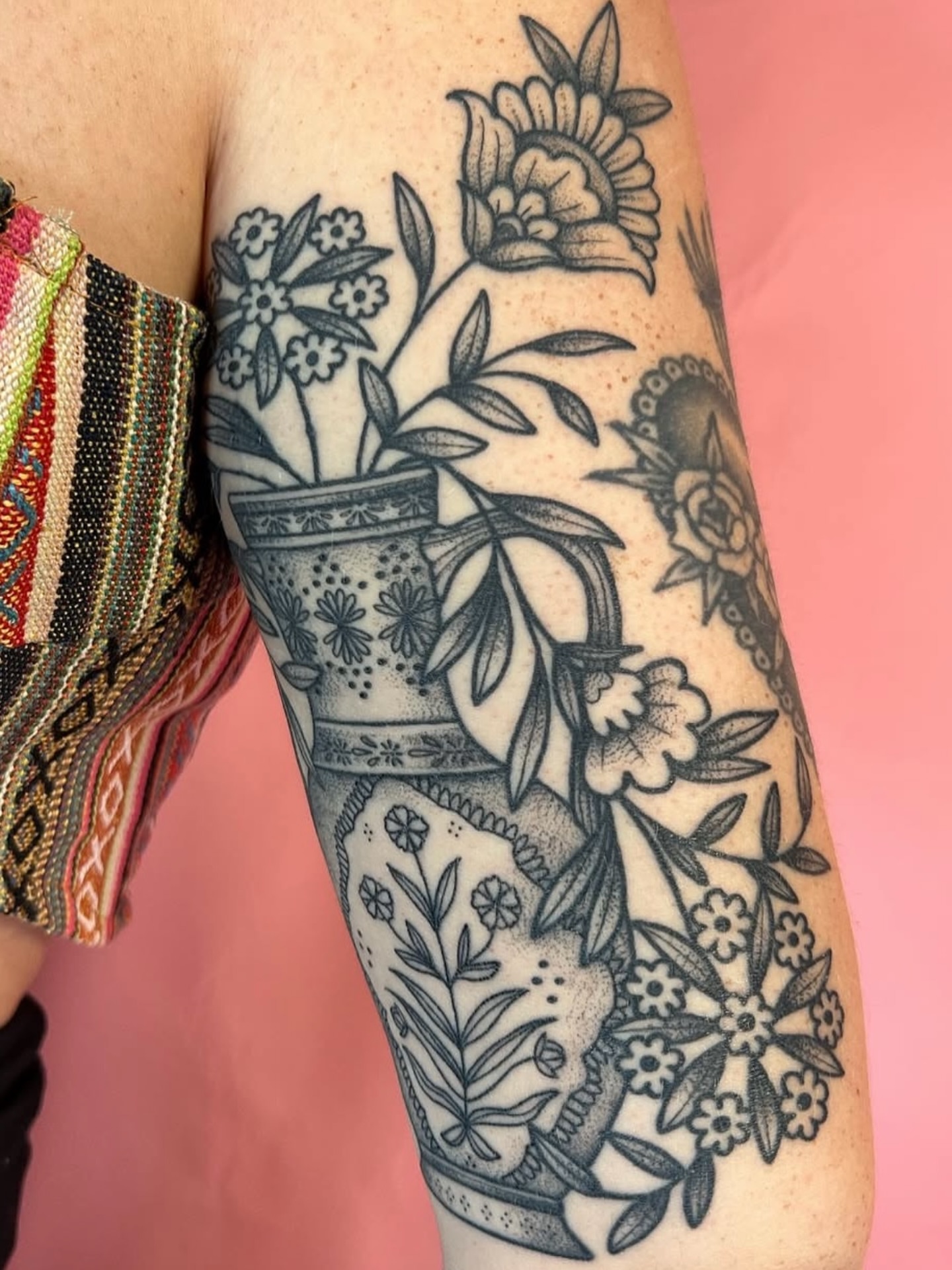 Floral arrangement ornamental tattoo on the forearm by Bri Leflore