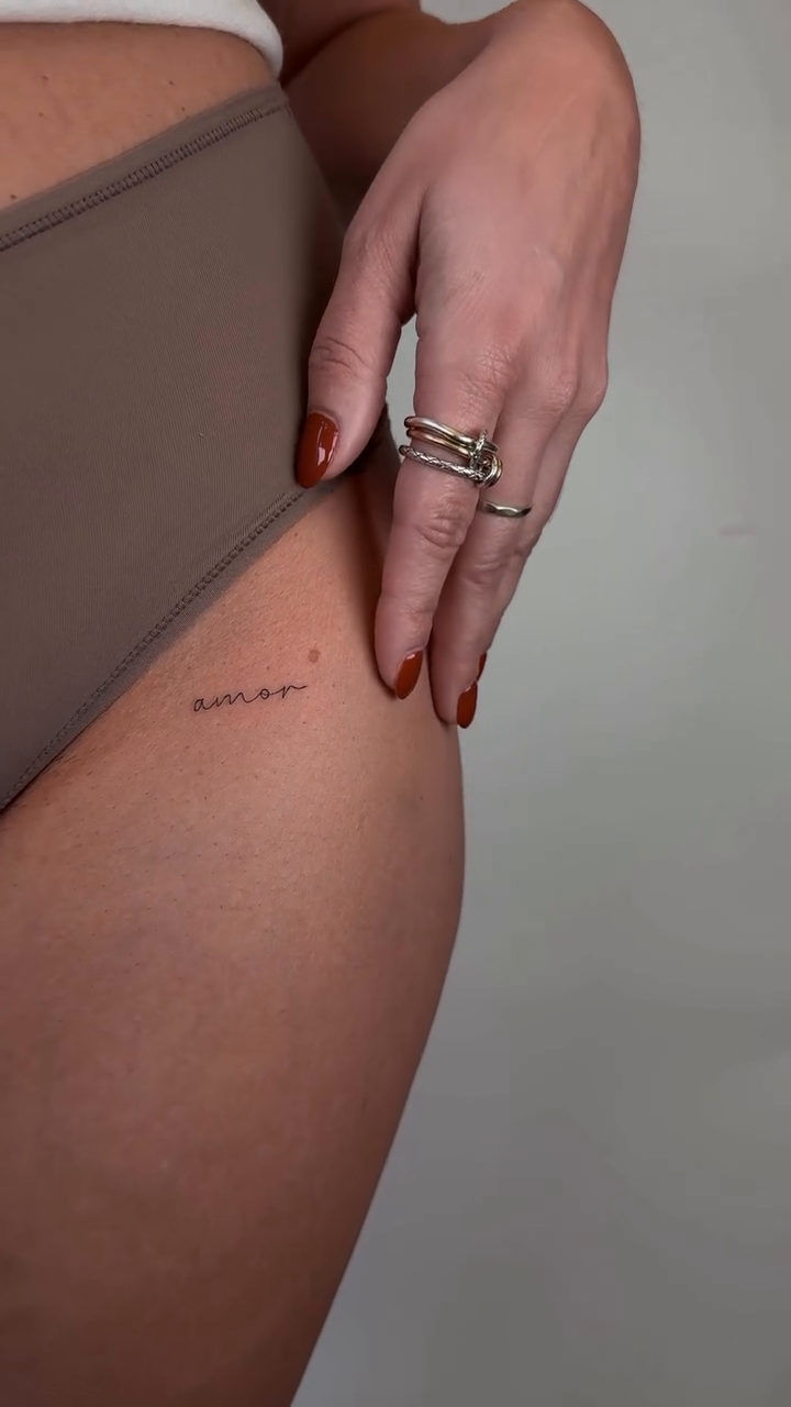 Small script tattoo minimalist tattoo on the leg by Fine line tattoo