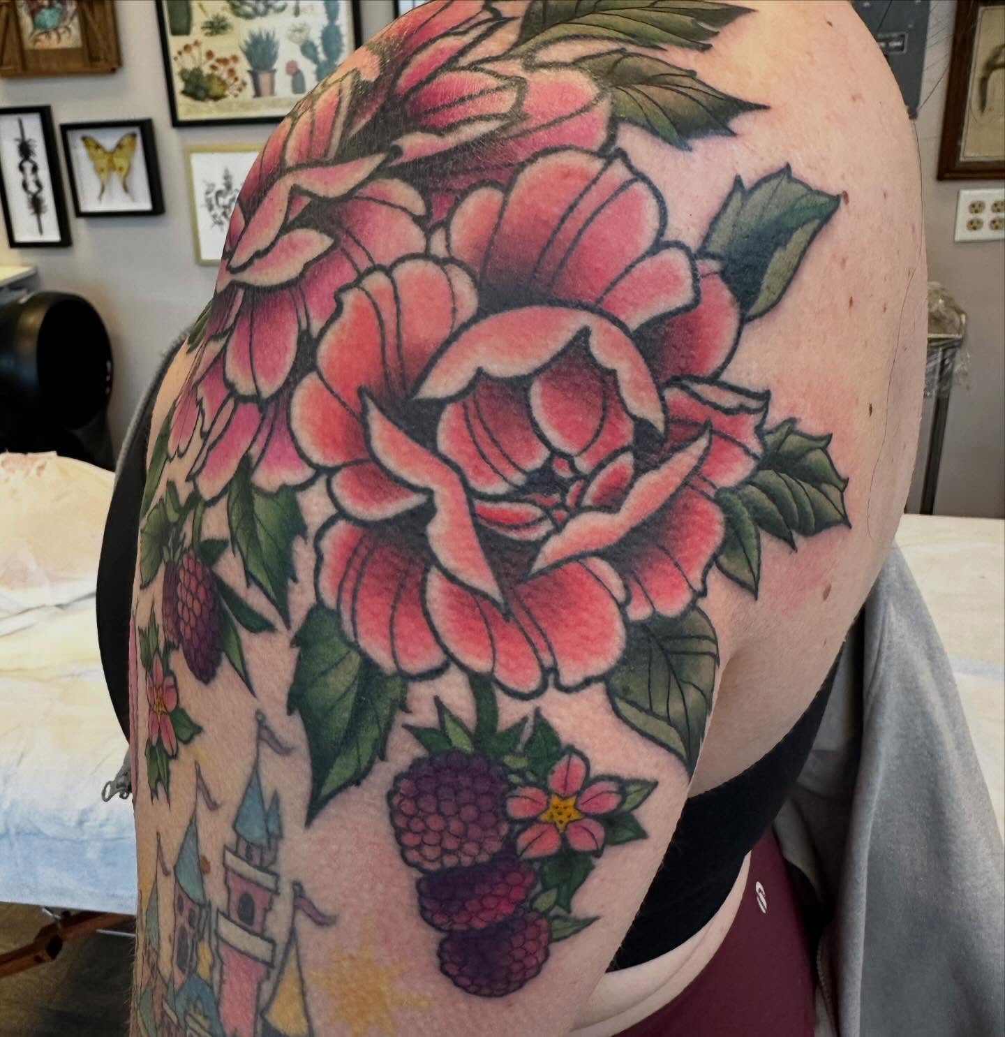 Peony flowers American traditional tattoo on the shoulder by Katie Beth