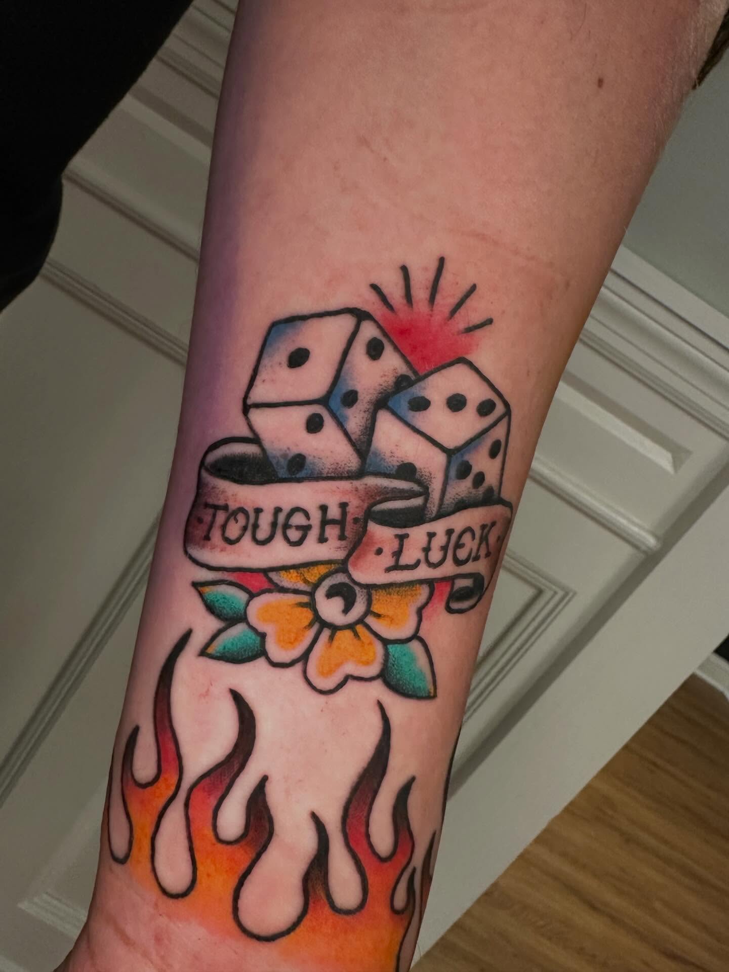 Dice and banner American traditional tattoo on the forearm by Jesse Boss, Nashville, Tennessee