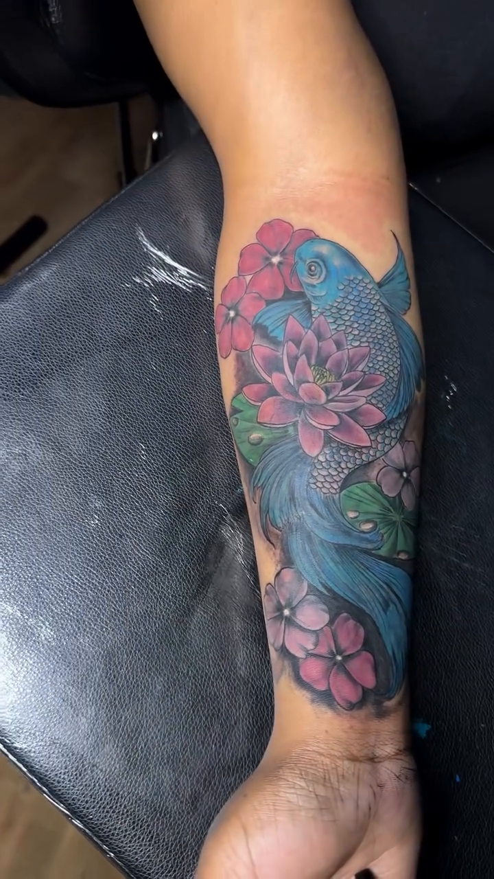 Peacock and flowers tattoo cover-up neo-traditional tattoo on the calf by TC 🧚🏽, Columbus, OH