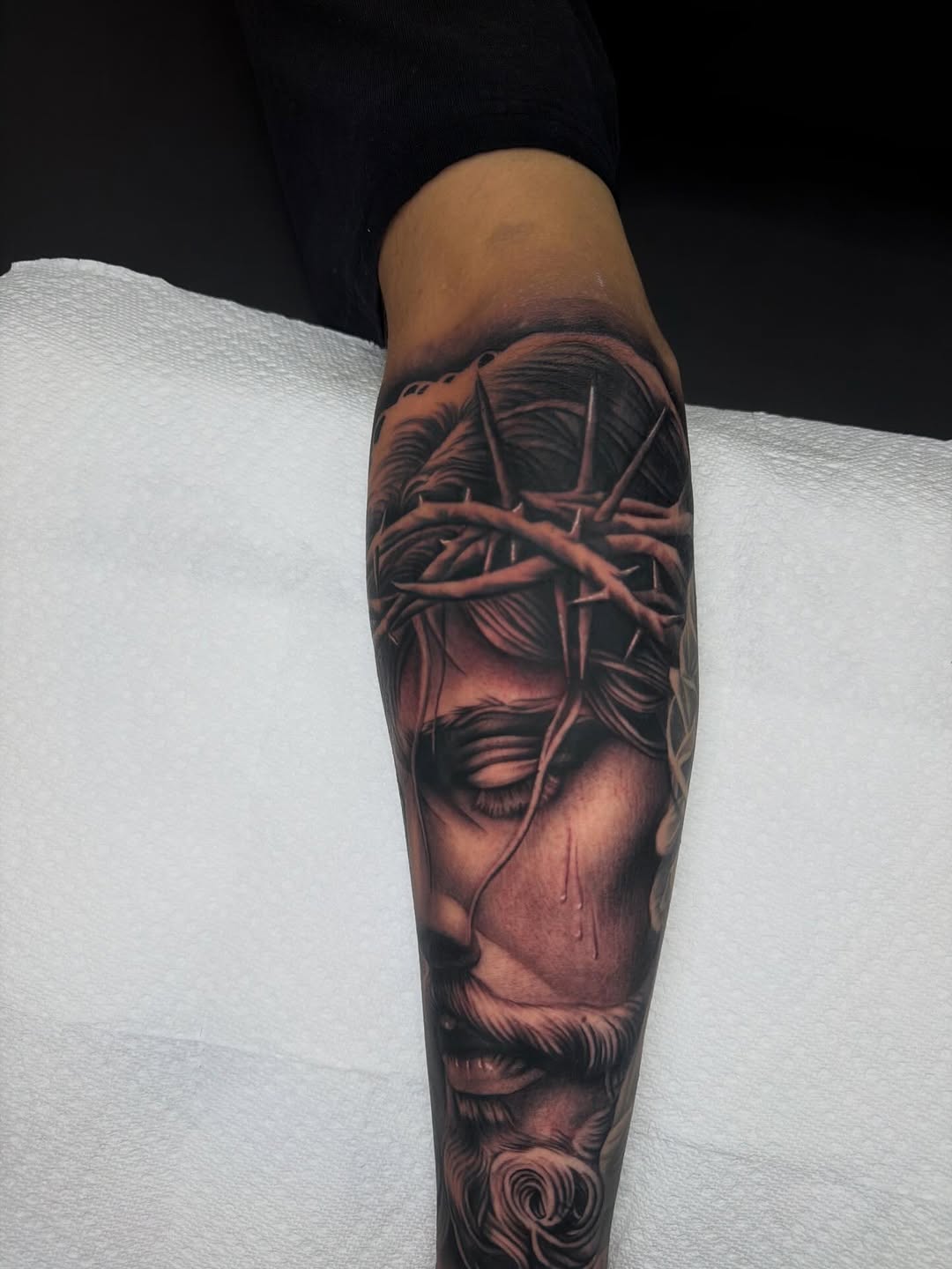 Jesus Christ portrait Chicano tattoo on the forearm by LOS