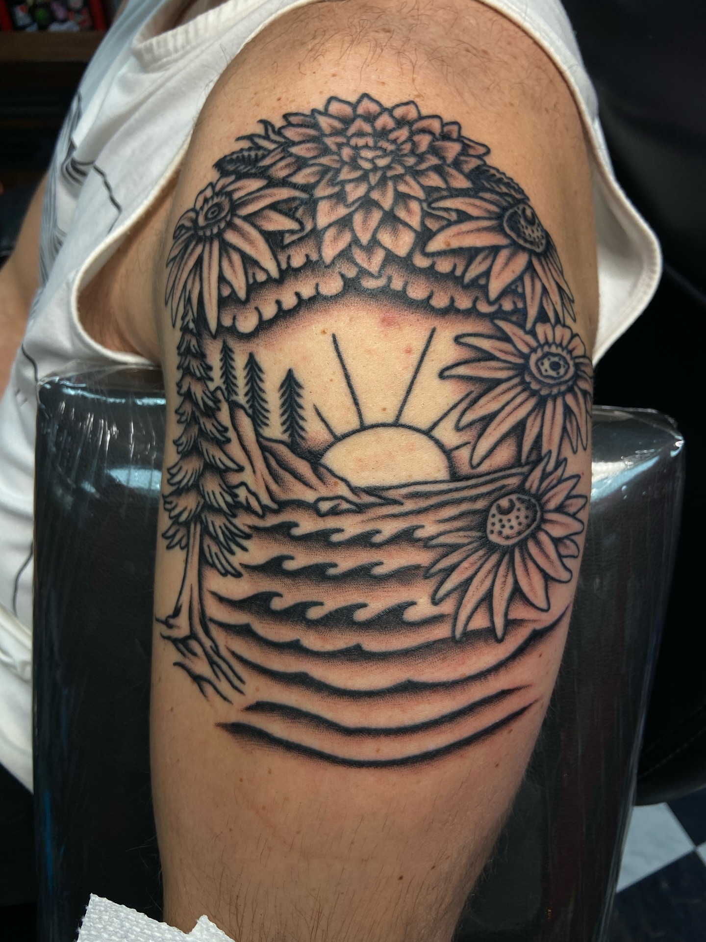 Sunset over ocean realism tattoo on the forearm by R y a n S m i t h