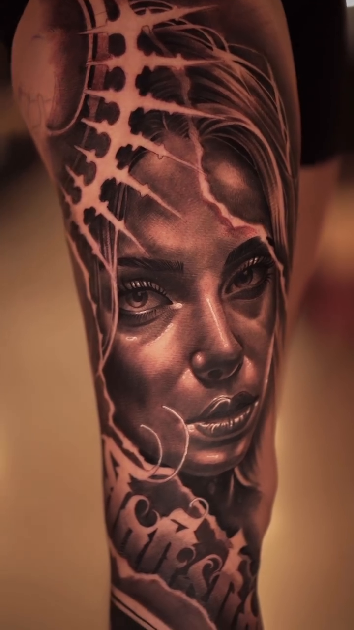 Two faces and abstract elements realism tattoo by Tattoos By Chino