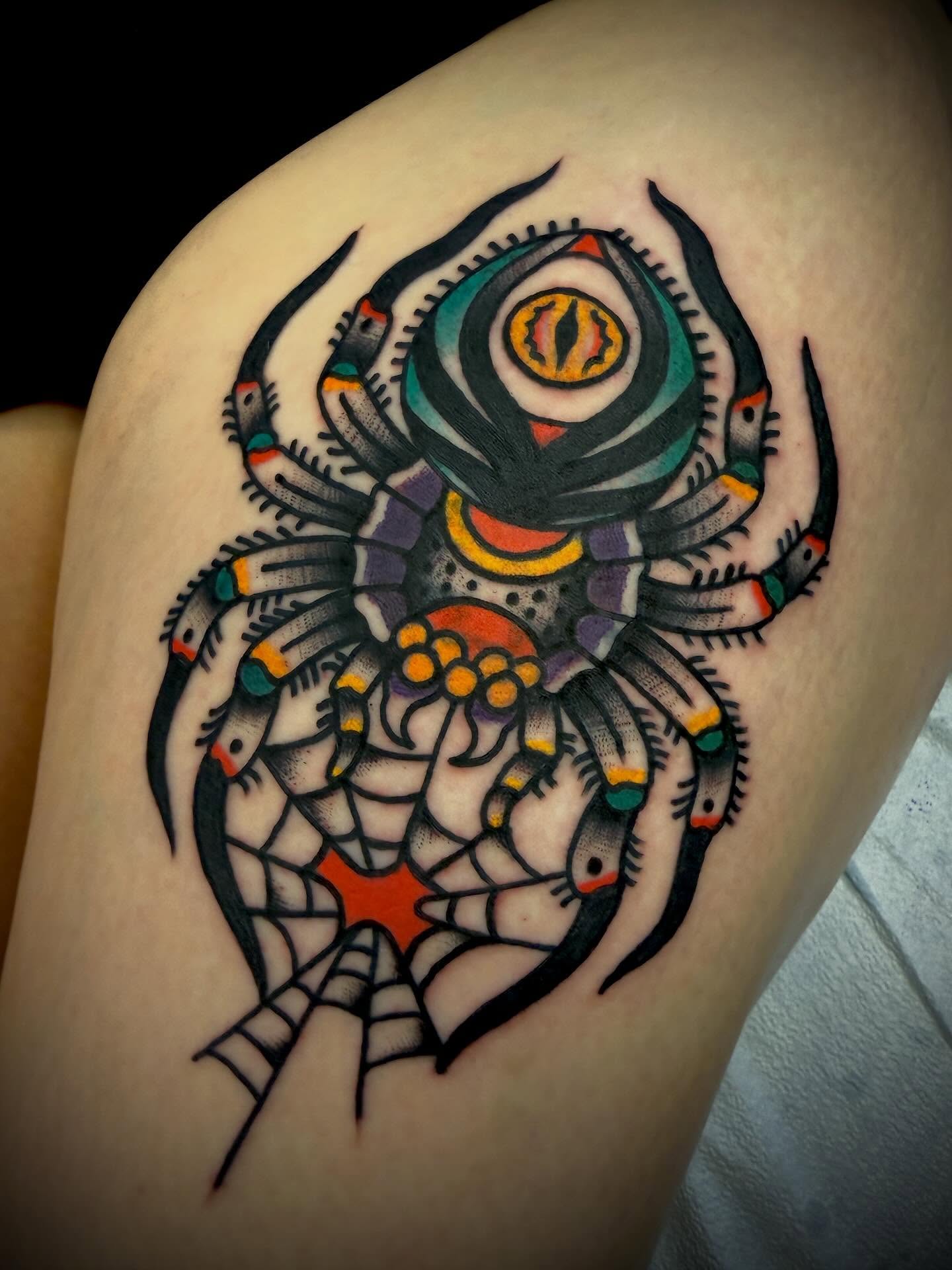 Spider geometric tattoo on the shoulder by Andrew Slater